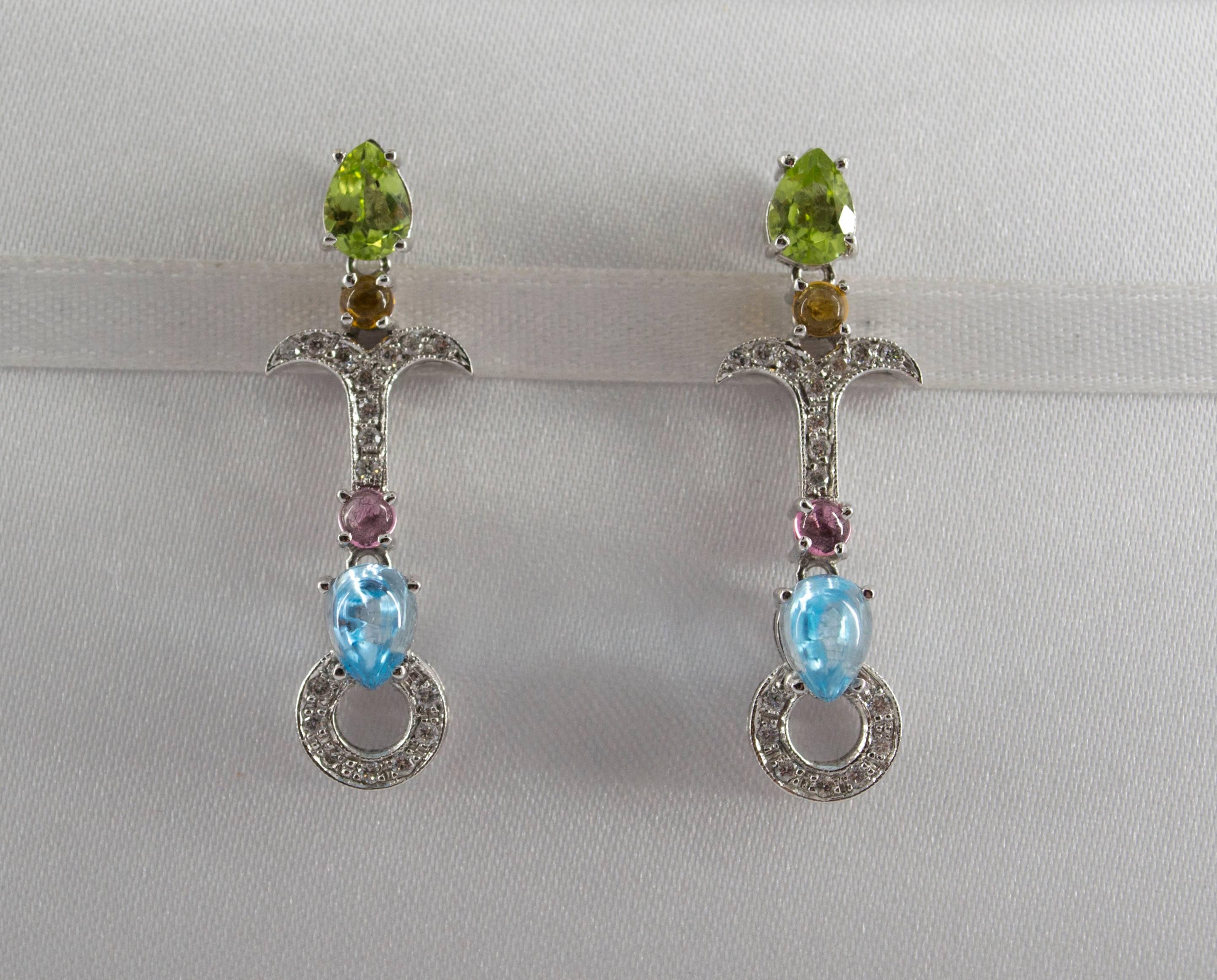 This Earrings are made of 9K White Gold.
This Earrings have Citrine and Amethyst.
This Earrings have 0.35 Carats of White Diamonds.
All our Earrings have pins for pierced ears but we can change the closure and make any of our Earrings suitable even