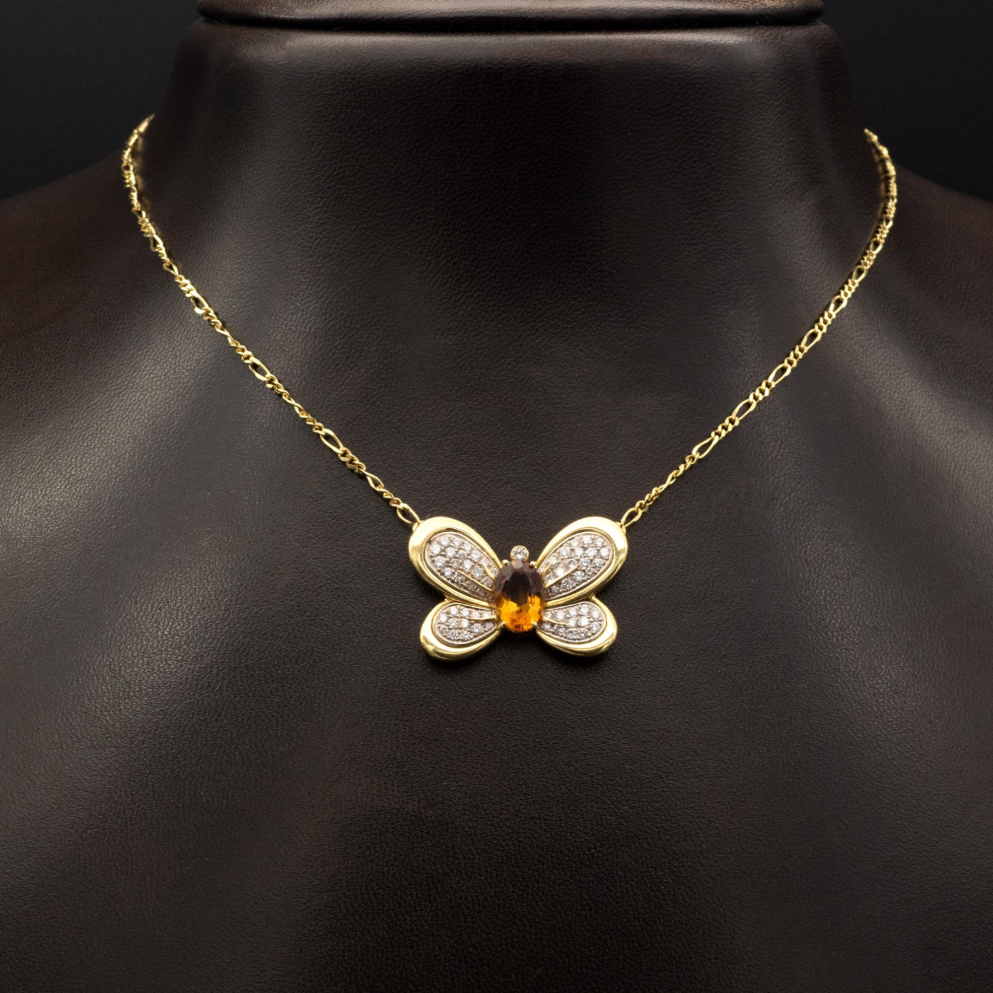 Exquisite butterfly necklace: citrine, pavé set diamonds on white gold inlayed in a yellow gold frame. Very refined work with great attention to details.

