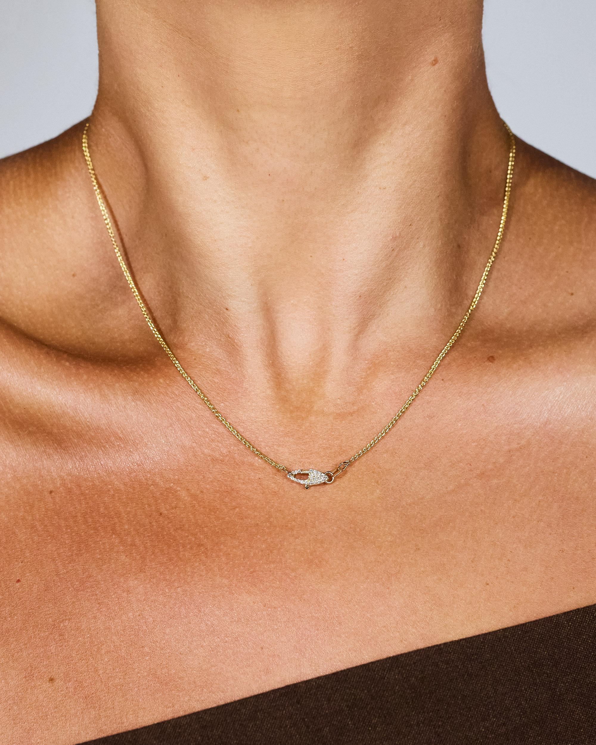 **This style is discounted because the chain length is retired as an option - last piece in stock. 

A solid 14k gold wheat chain featuring a custom hand-pavé double-sided diamond clasp. We love this style for its unisex and vintage feel. Can be