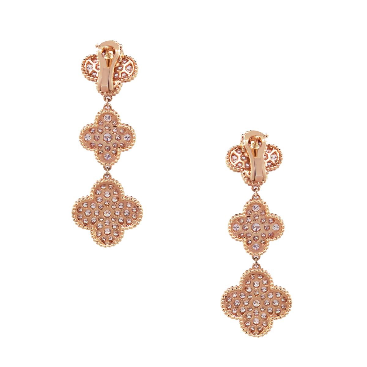 Material: 18k rose gold
Diamond Details: Approximately 4.34ctw round brilliant diamonds. Diamonds are G/H in color and VS in clarity.
Earring Measurements: 0.75″ x 0.07″ x 2.25″
Total Weight: 23.3g (15dwt)
Earring backs: Omega backs 
SKU: G9308
