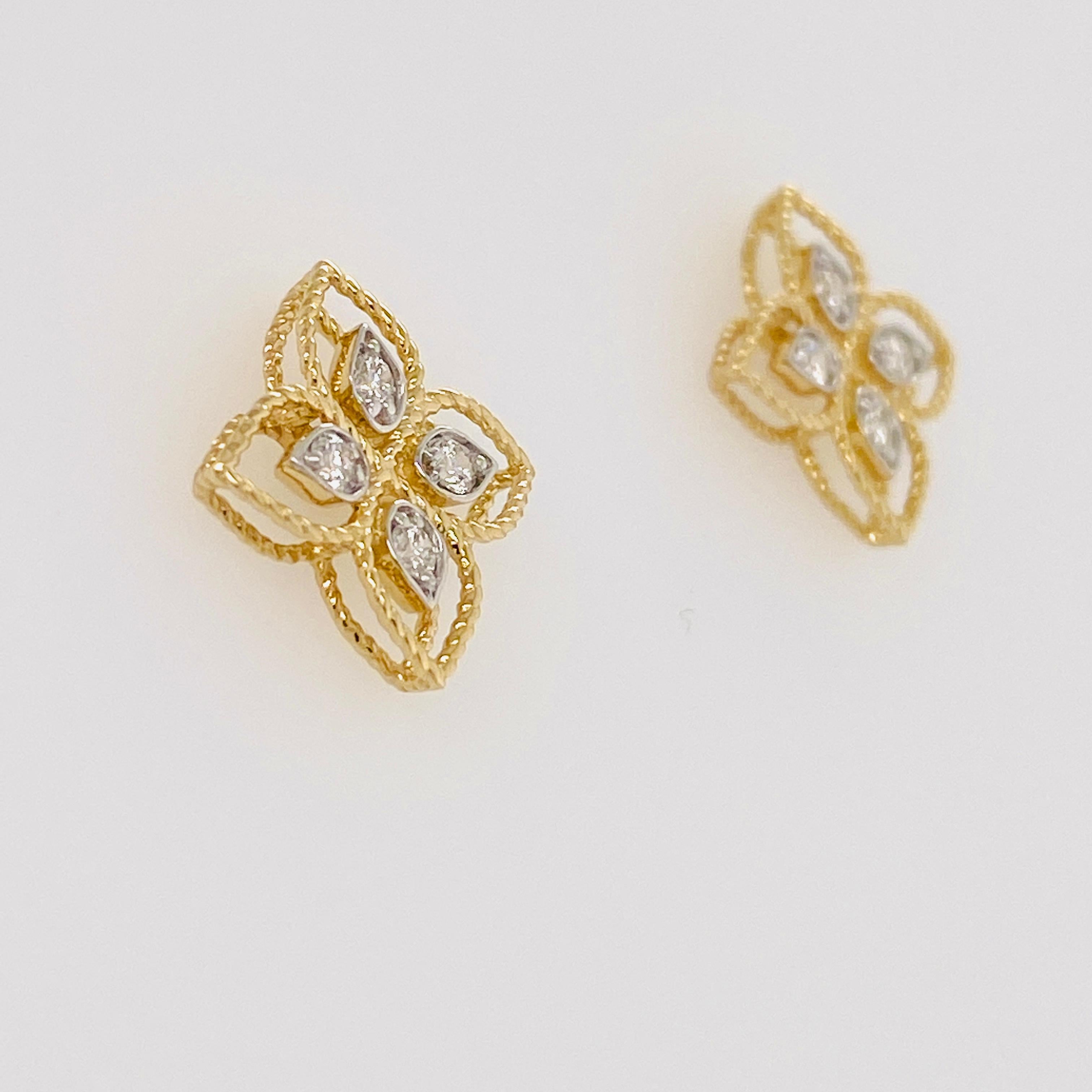 These intricate earrings are very detailed w a clover design that has four diamonds in each earring. There is a textured rope design on the earrings. The diamond weight is .18 carats and the diamonds are excellent quality-VS2 clarity and F/G color.
