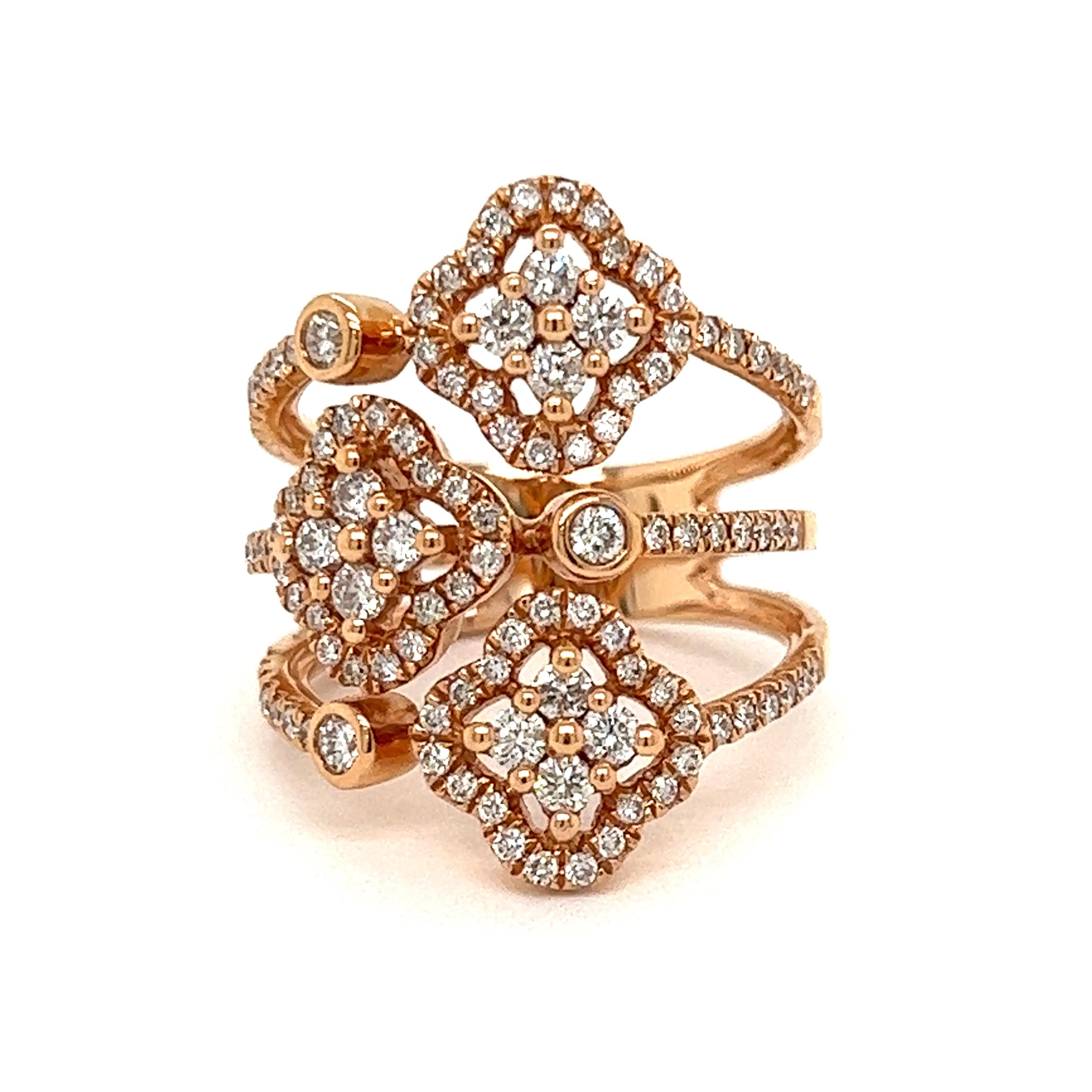 This multi row ring is a unique play on the iconic four leaf clover design.   Approximately 2 ctw in shimmering round diamonds. Set in 7.50 grams of 18K rose gold this outstanding ring makes a statement.  Perfect for an anniversary gift, push