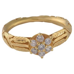 Anillo de compromiso de oro de 18 quilates con racimo de diamantes