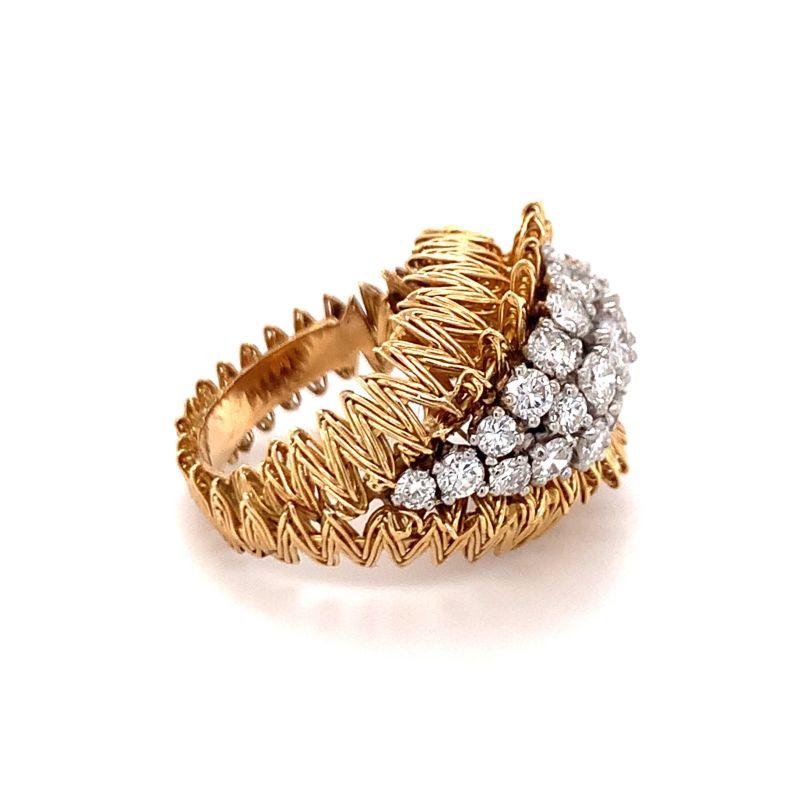 One diamond cluster 18K yellow gold ring featuring 19 round brilliant cut diamonds totaling 1.80 ct. with an impeccable gold wire, jagged petal design with a textured gold finish. French made with hallmarks. Circa 1960s.

Splendid, impeccable,