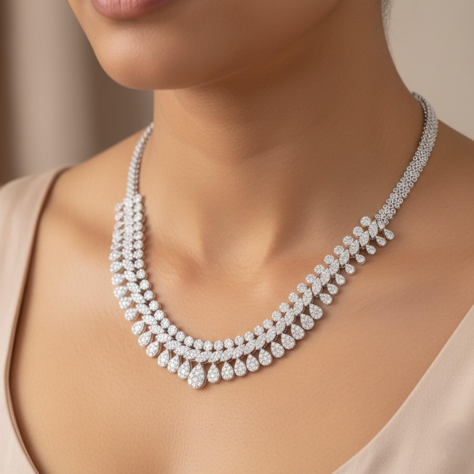 Diamond Cluster 20.6 Carat SI Clarity HI Color Choker Necklace 18k White Gold 
This is a wide, continuous, V-shaped collar or choker-style necklace, designed to sit high on the neckline and dramatically drape across the collarbone. The primary
