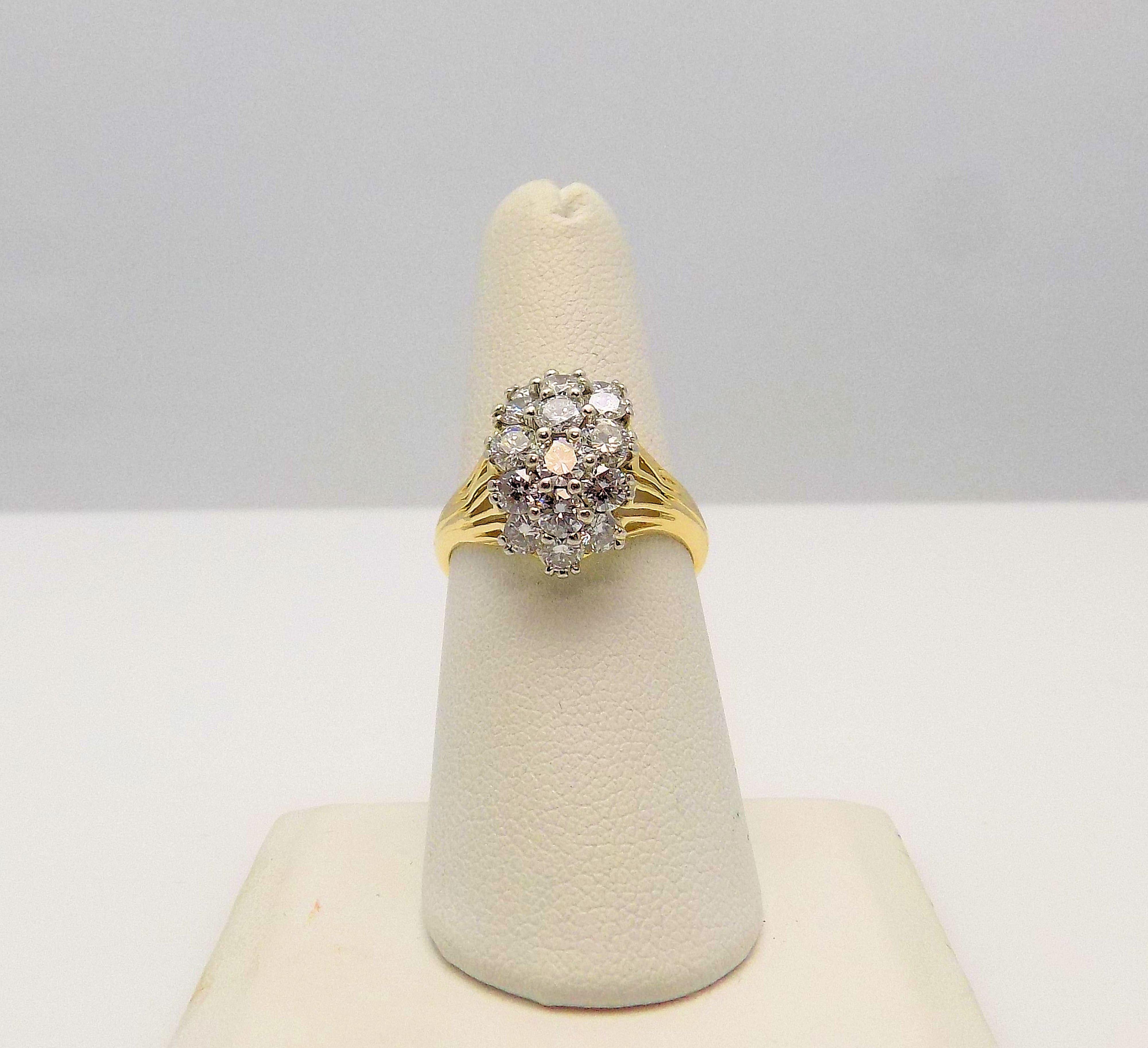 Stunning 18 Karat Yellow Gold Cluster Ring featuring 16 Round Brilliant Diamonds 2.00 Carat Total Weight; VS2-SI1, G-H; Finger Size 7.5; 3.5 DWT or 5.44 Grams.