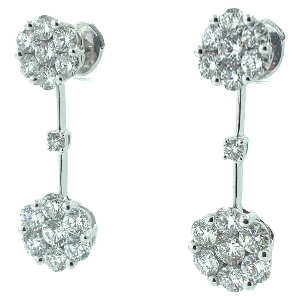 Round Cut Diamond Cluster Drop Earrings in 18 Karat White Gold