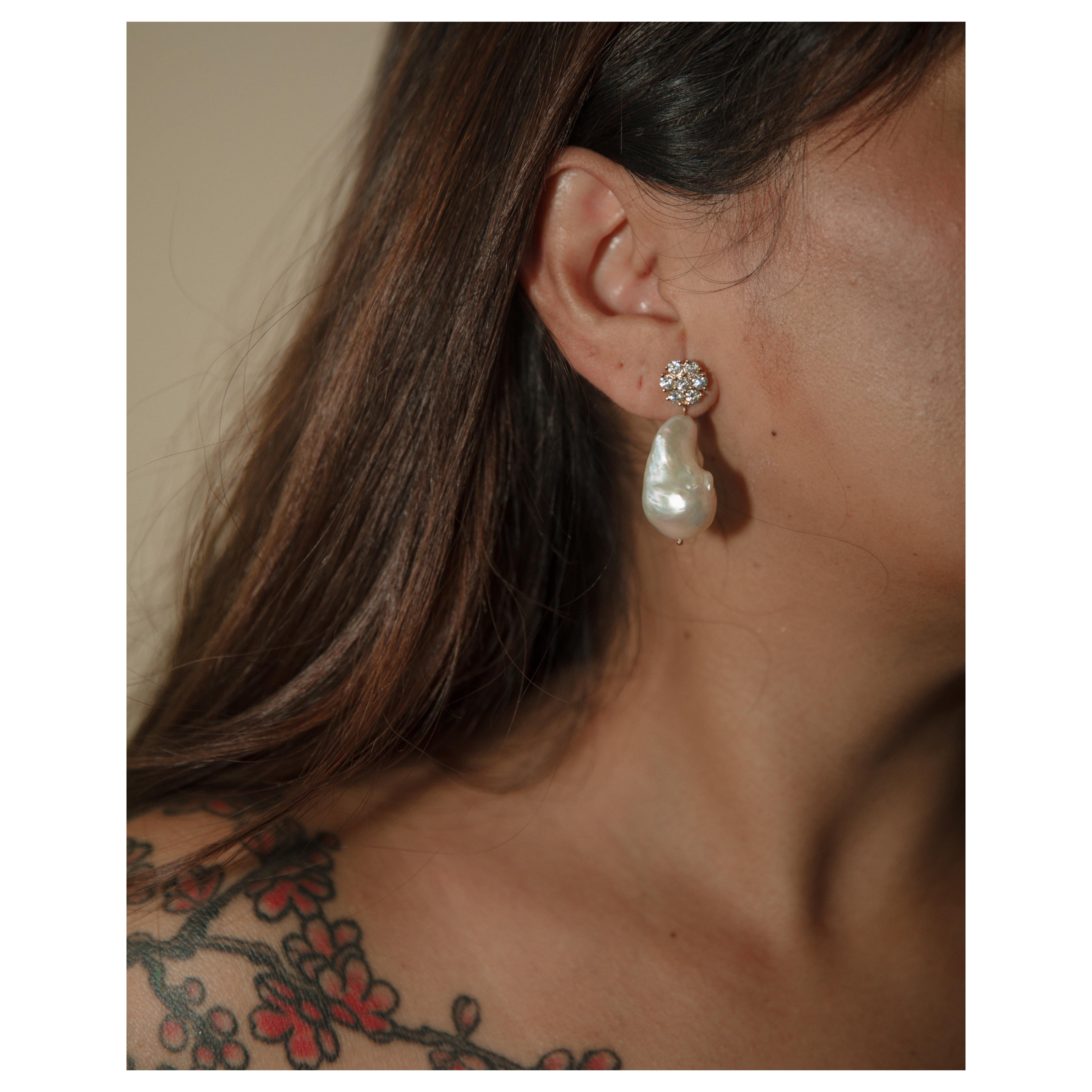 Pendientes florales de diamantes redondos 100% naturales para un look femenino.


Detalles del producto:

14 diamantes redondos

10 puntos cada uno, peso total: 1,40ct

GH-SI1

Empuja hacia atrás

1,75 pulgadas de caída

Ancho de la flor 5 mm

oro