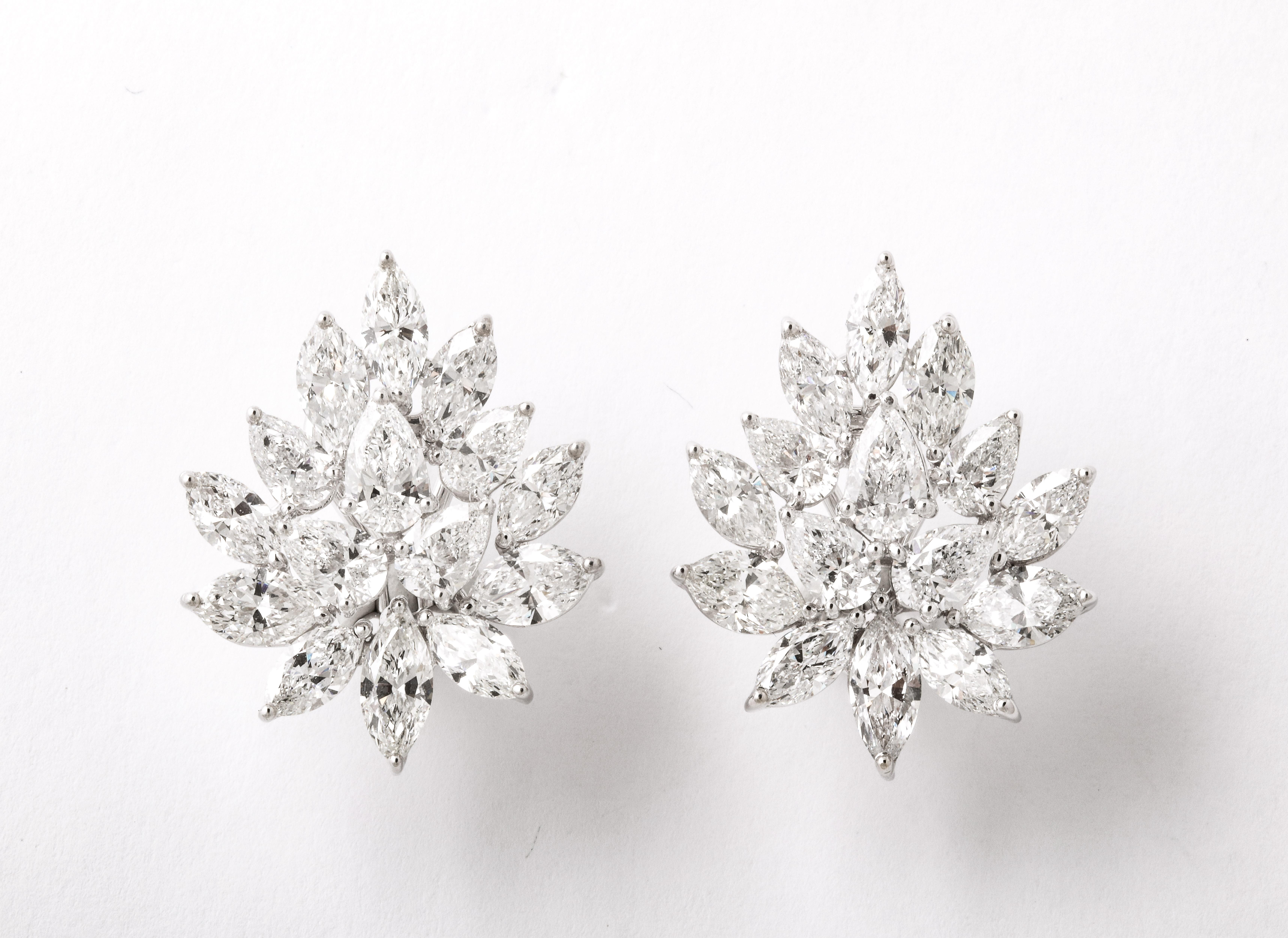 
A grand cluster earring. 

14.86 carats of white pear and marquise shape diamonds set in 18k white gold. 

Approximately 1.18 inches long x .90 inches wide. 

A fabulous piece!