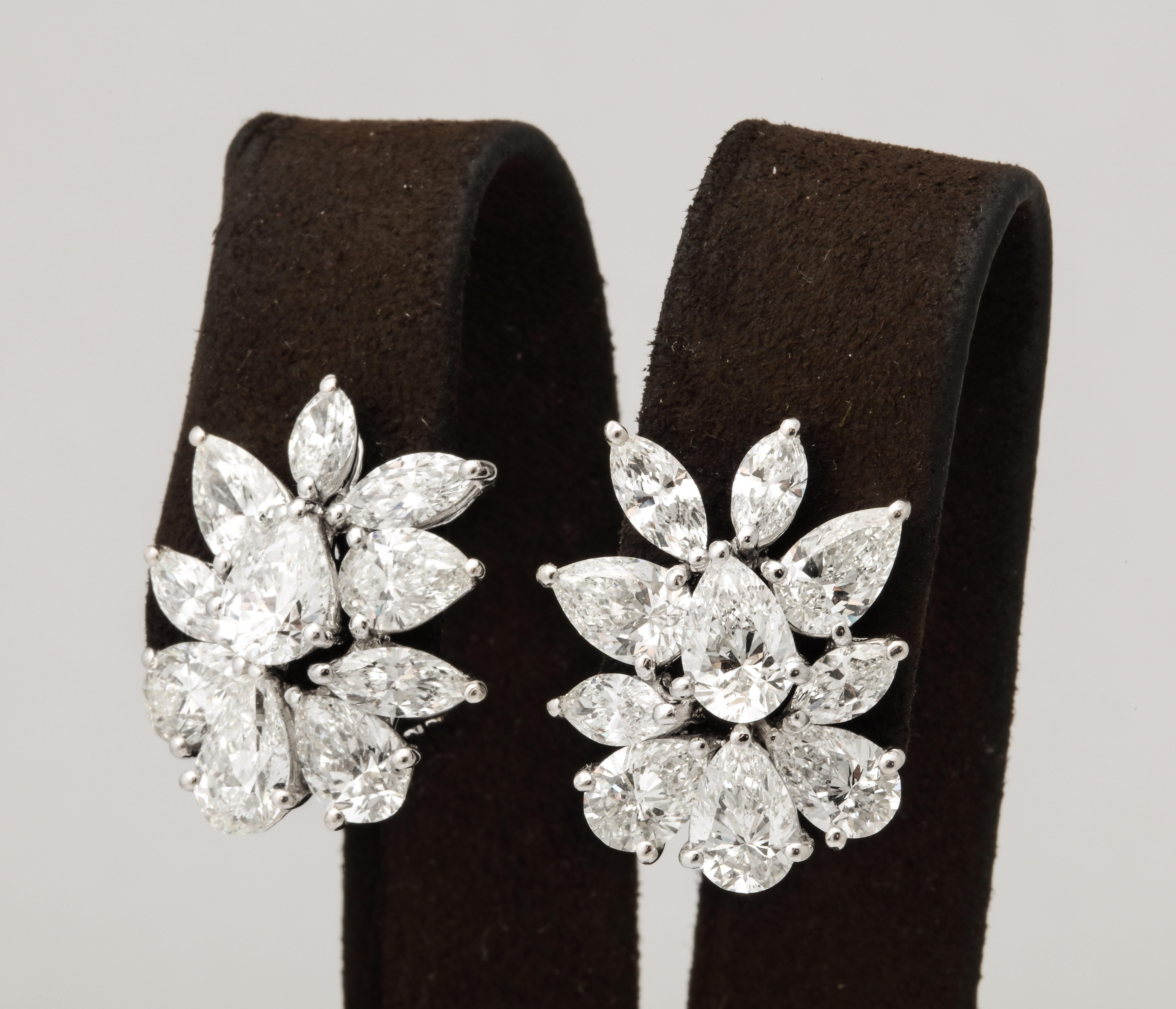 
A fabulous pair of cluster earrings!

11.39 carats of white pear and marquise shaped diamonds set in platinum. 

Just under an inch in length - .75 inches wide. 

An important look and design.