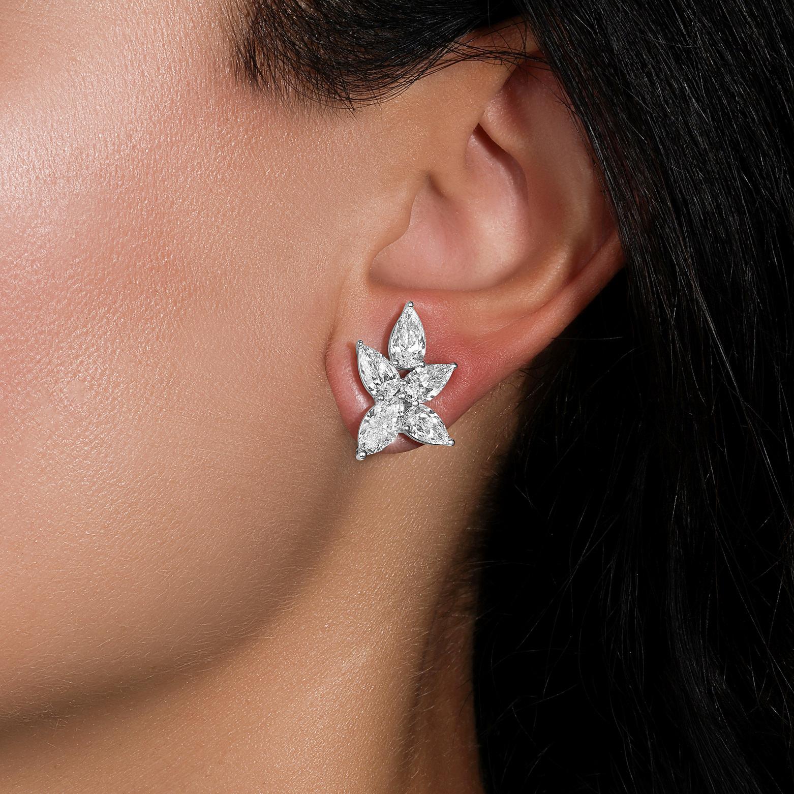 It comes with the Gemological Appraisal by GIA GG/AJP
All gemstones are natural
8 Pear Cut Diamonds = 4.38 Carats
2 Marquise Cut Diamonds = 1.42 Carats
Metal: 18K White Gold