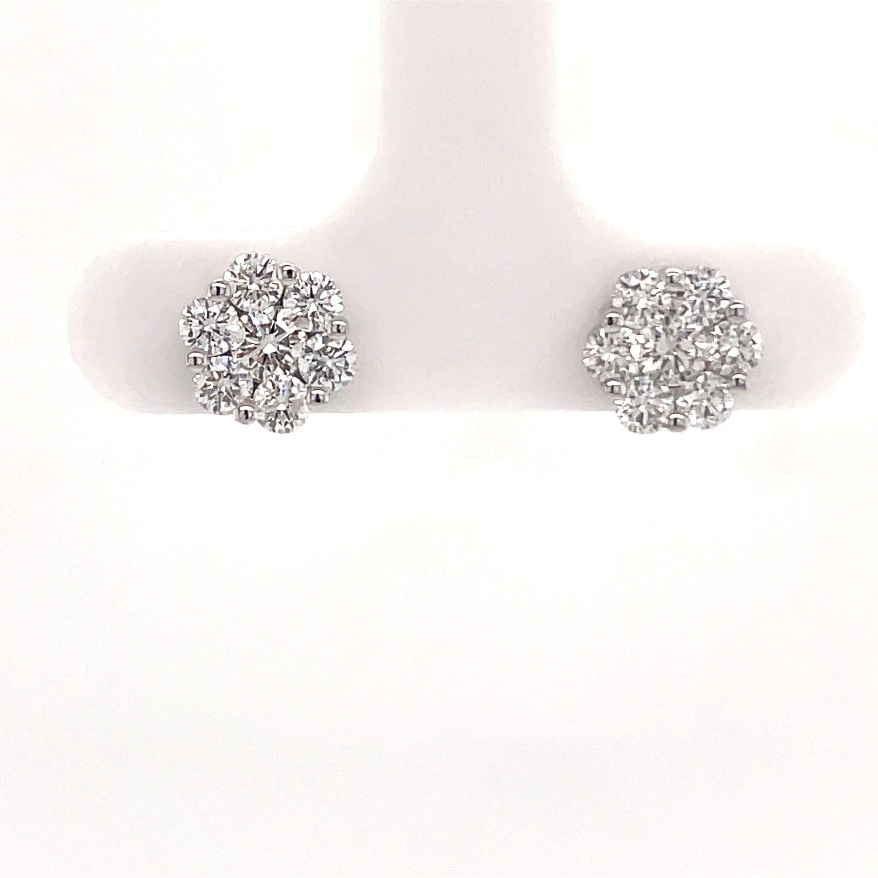 14 Karat White gold cluster earrings featuring 14round brilliants weighing 1.04 carats.
Color G-H
Clarity SI

Available in all sizes and gold color. 