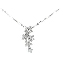Collier pendentif grappe de diamants 0,58 carat en or blanc 14K