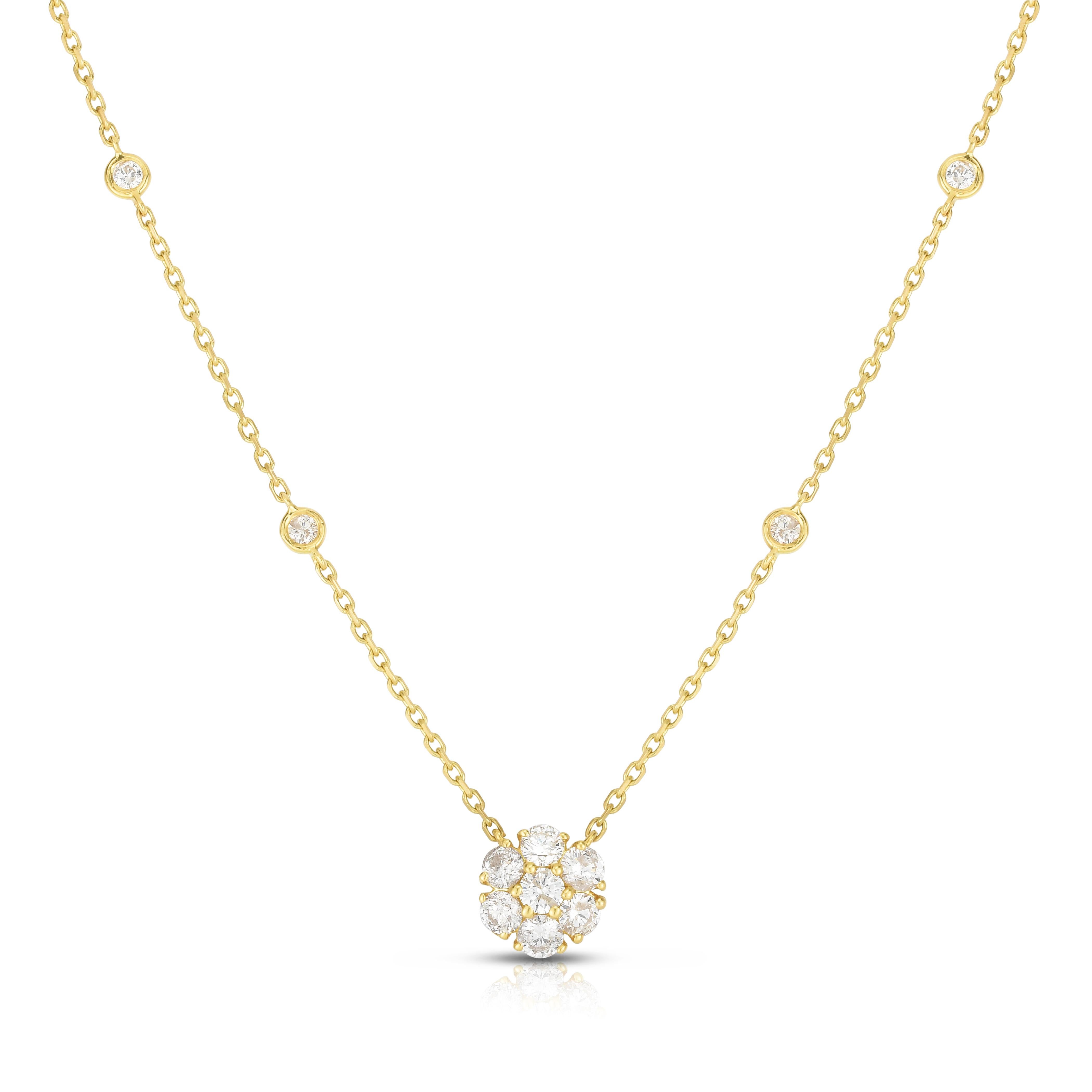 Grácil y lleno de brillo, este collar de diamantes en racimo es un diseño atemporal que irradia elegancia. Elaborado en oro blanco de 14 quilates, el colgante muestra un racimo de diamantes brillantes redondos naturales de inspiración floral que