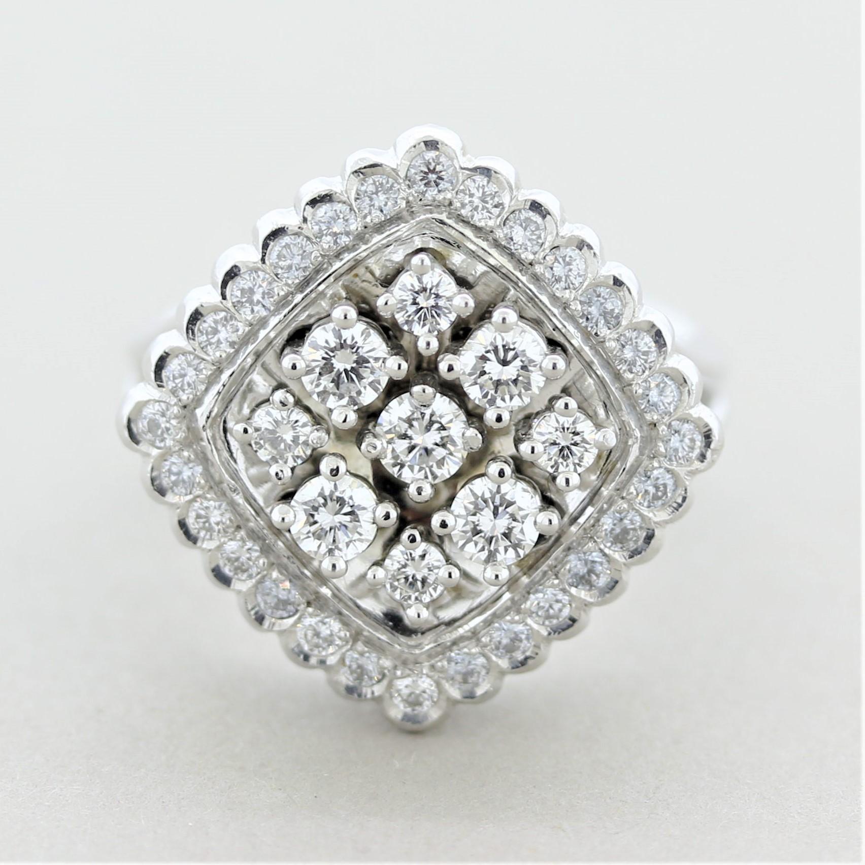 A modern and stylish ring featuring 1.17 carats of round brilliant-cut diamonds. The larger diamonds are cluster-set in the center of the ring with smaller rounds set around them. Hand-fabricated in platinum and ready to be worn, day or night.

Ring