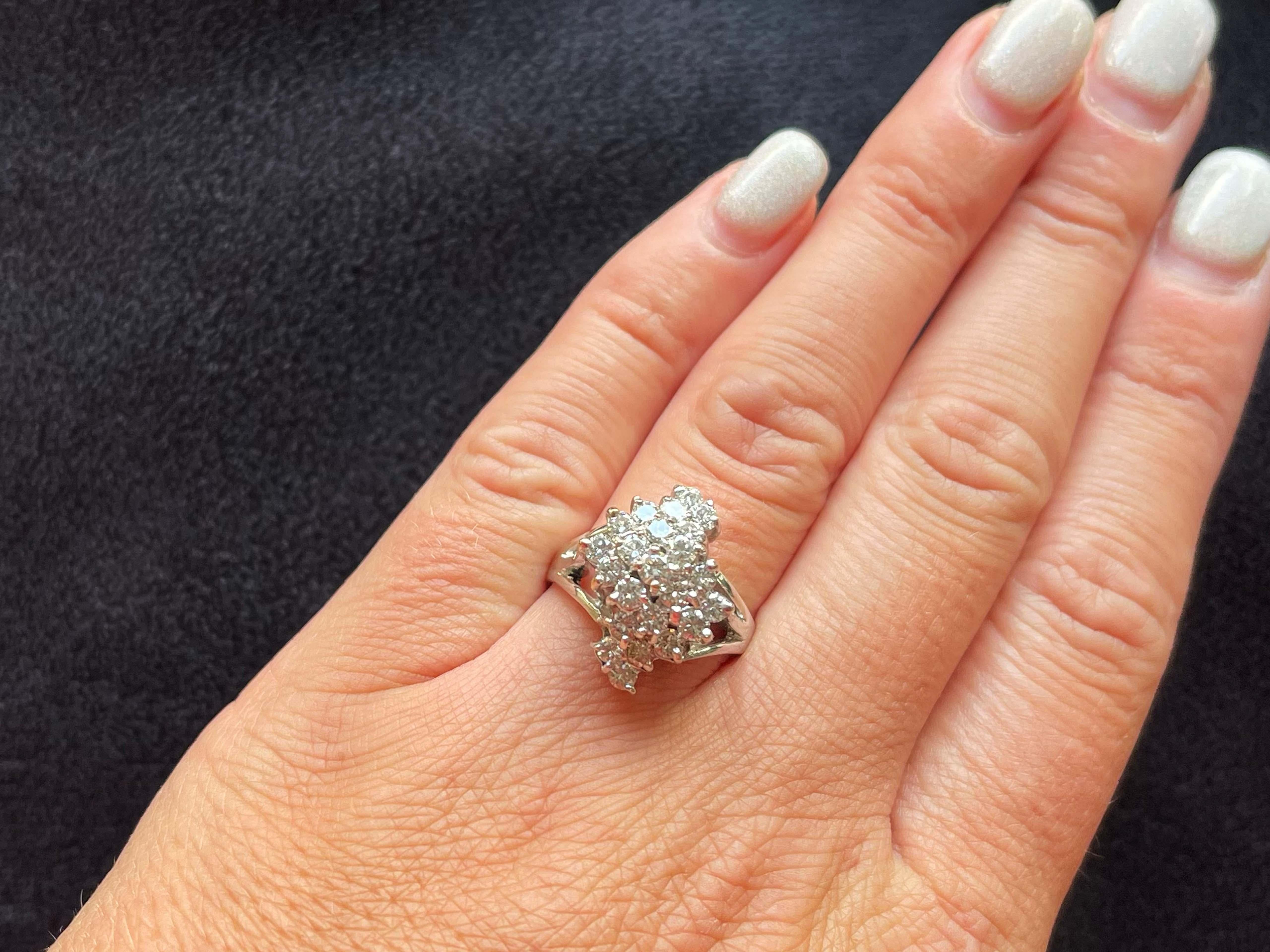 Item Specifications:

Metal: 14k White Gold 
​
​Diamond Count: 23 brilliant cut 

Diamond Carat Weight: 1.20 carats

Diamond Color: G-H

Diamond Clarity: VS1-SI1

Ring Size: 8.75 (resizable)

Total Weight: 6.0 Grams

Condition: Preowned, Excellent