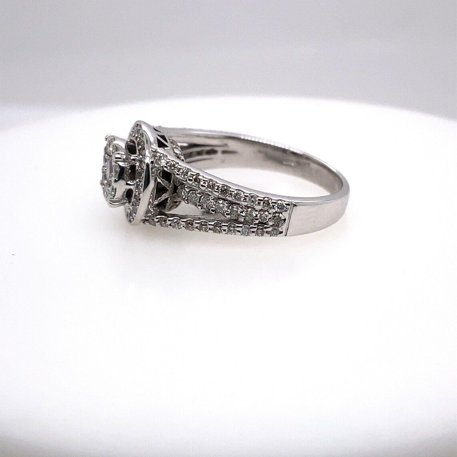 Diamond Cluster Ringn Set with 0.75ct of Round Diamonds in 18ct White Gold In Excellent Condition For Sale In London, GB