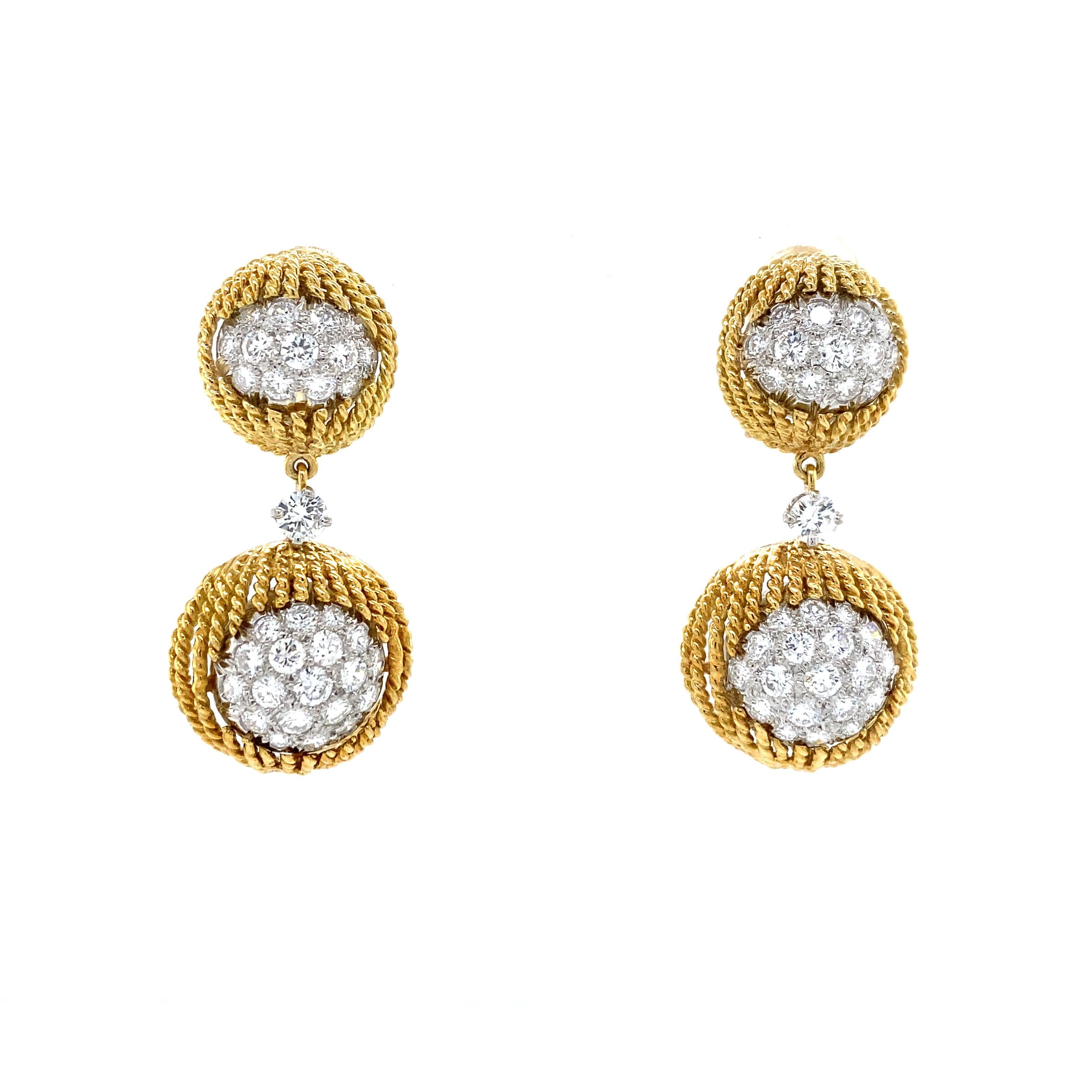 Diamond Cluster Rope Drop Earring in Platinum and 18K Yellow Gold.  Round Brilliant Cut Diamonds weighing 4.18 carat total weight, G-H in color and VS in clarity are expertly set.  The Earrings measure 1 1/2 inch in length and 3/4 inch in width are