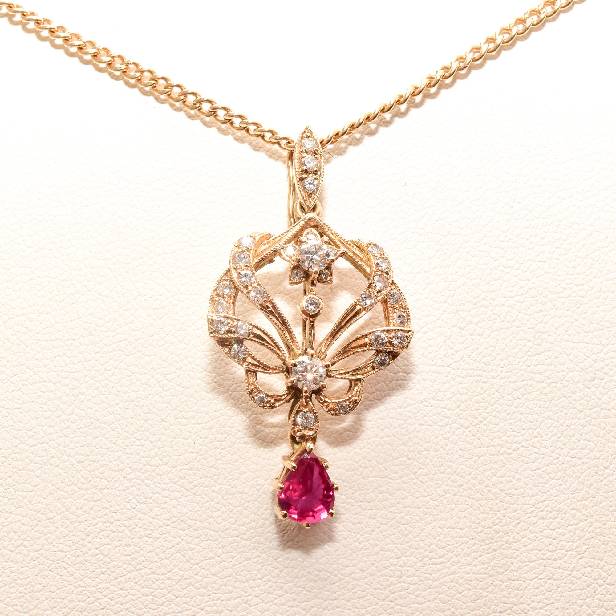 Diamond Cluster Ruby Lavaliere Pendant Necklace in 14k Yellow Gold In Good Condition For Sale In Philadelphia, PA