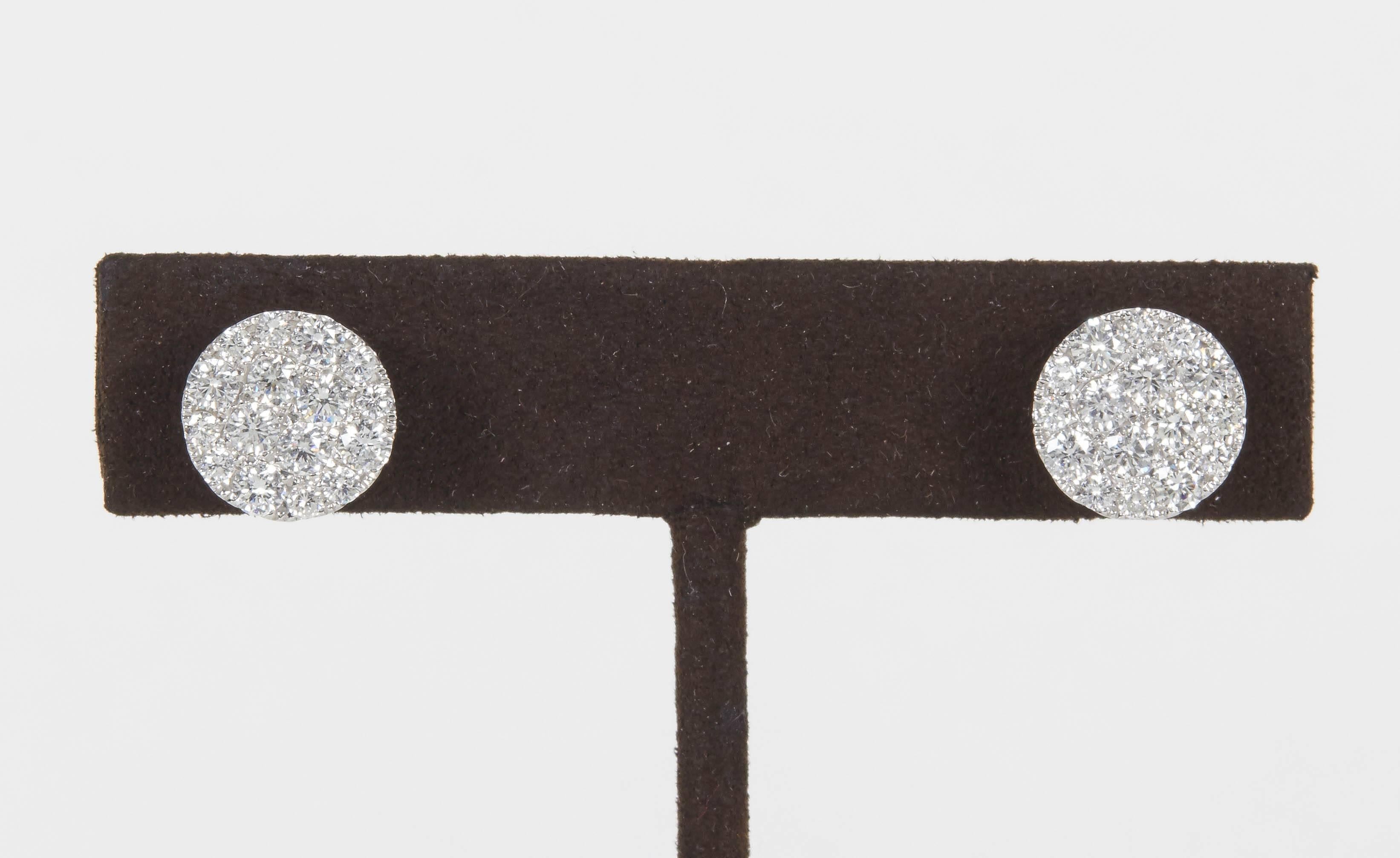 

1.68 carats of FG color VS clarity diamonds set in 18k gold mounting with push backs. 

A fabulous pair of earrings with an enormous amount of look and sparkle!

11.1 mm / 0.437 inch diameter 

The perfect gift!