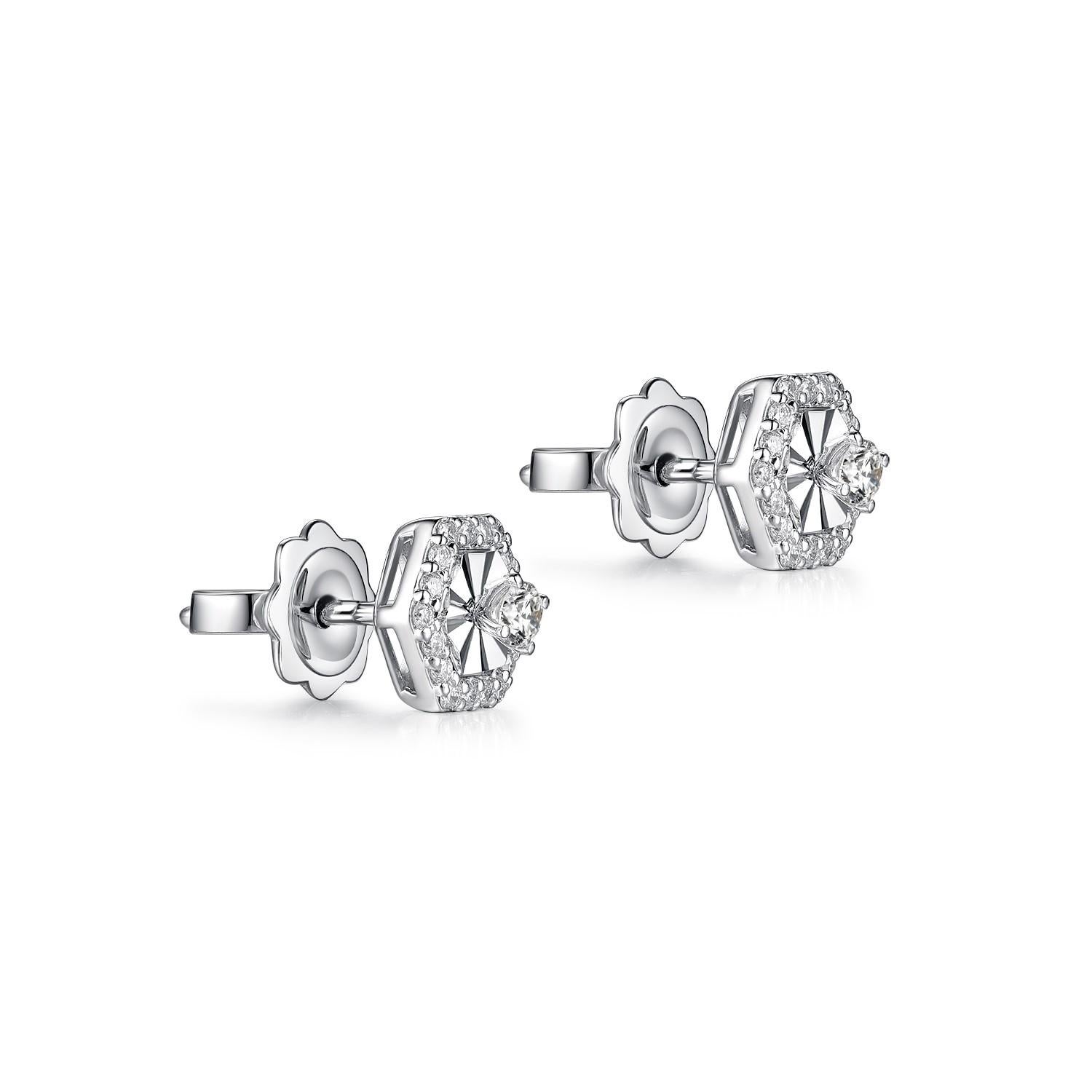This earrings feature 0.32 carat of round diamonds.  The center contains 2 round diamonds and with a diamond halo on the outside.  Earrings are set in 14 karat white gold.  A simply piece that great for everyday use.

14 karat white gold
Diamond