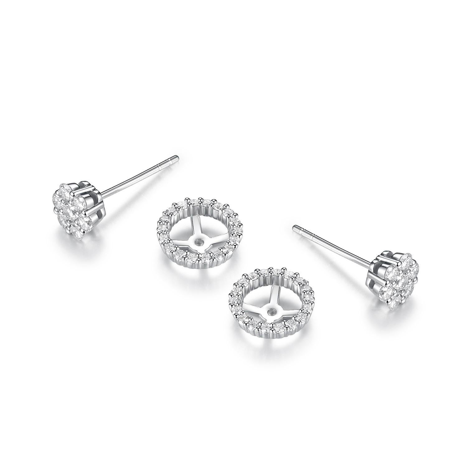 These Diamond Cluster Stud Earrings with a Diamond Halo Jacket are a stunning pair of earrings crafted in 18 karat white gold. They feature a total of 0.86 carats of round diamonds, creating a beautiful display of brilliance and sparkle.

The center