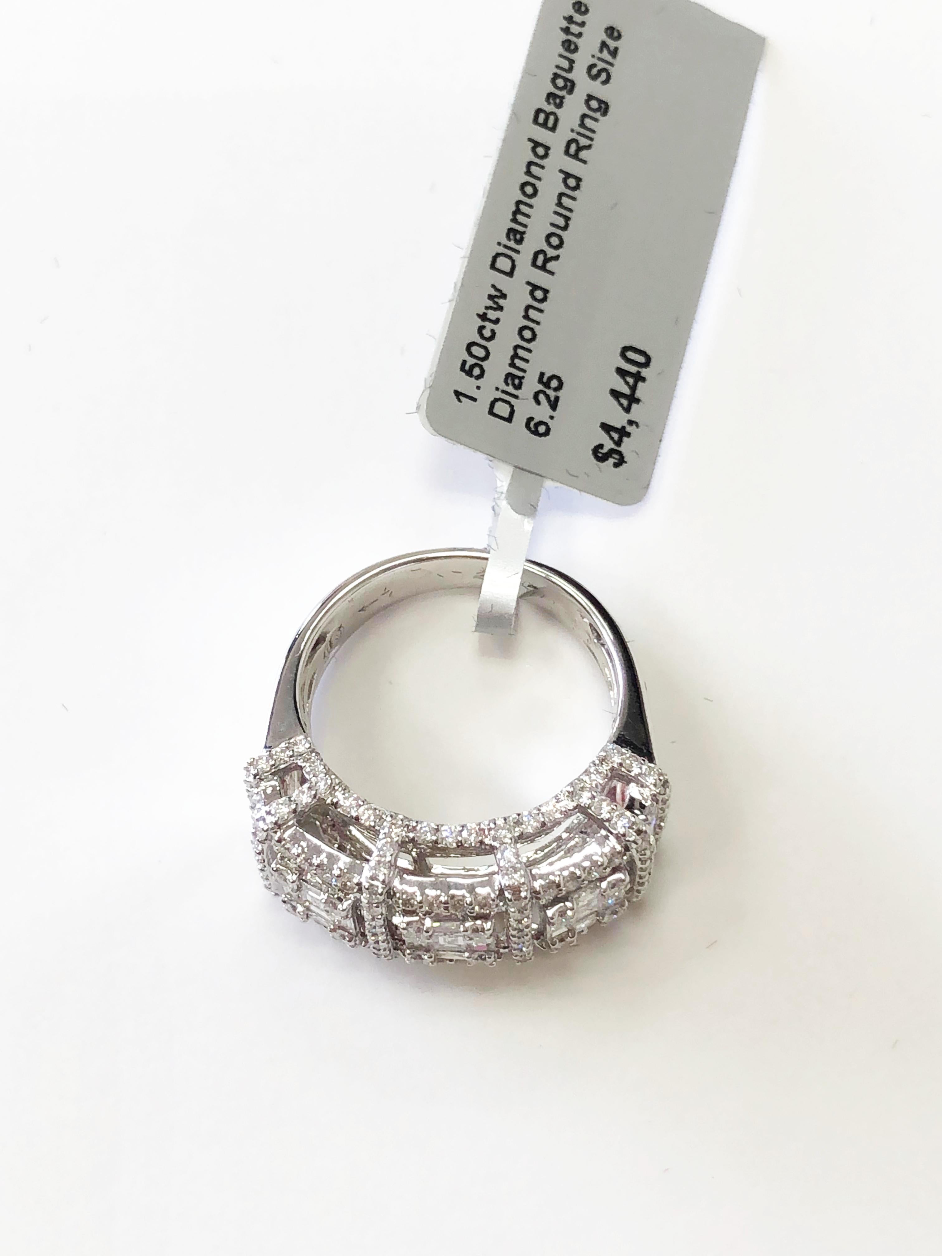 Beautiful invisible set diamond cocktail ring. 1.50 carats of good quality white, bright diamond rounds and baguettes in this ring. The stones are set in a way that it makes them look like bigger individual stones. A great price for a big look!