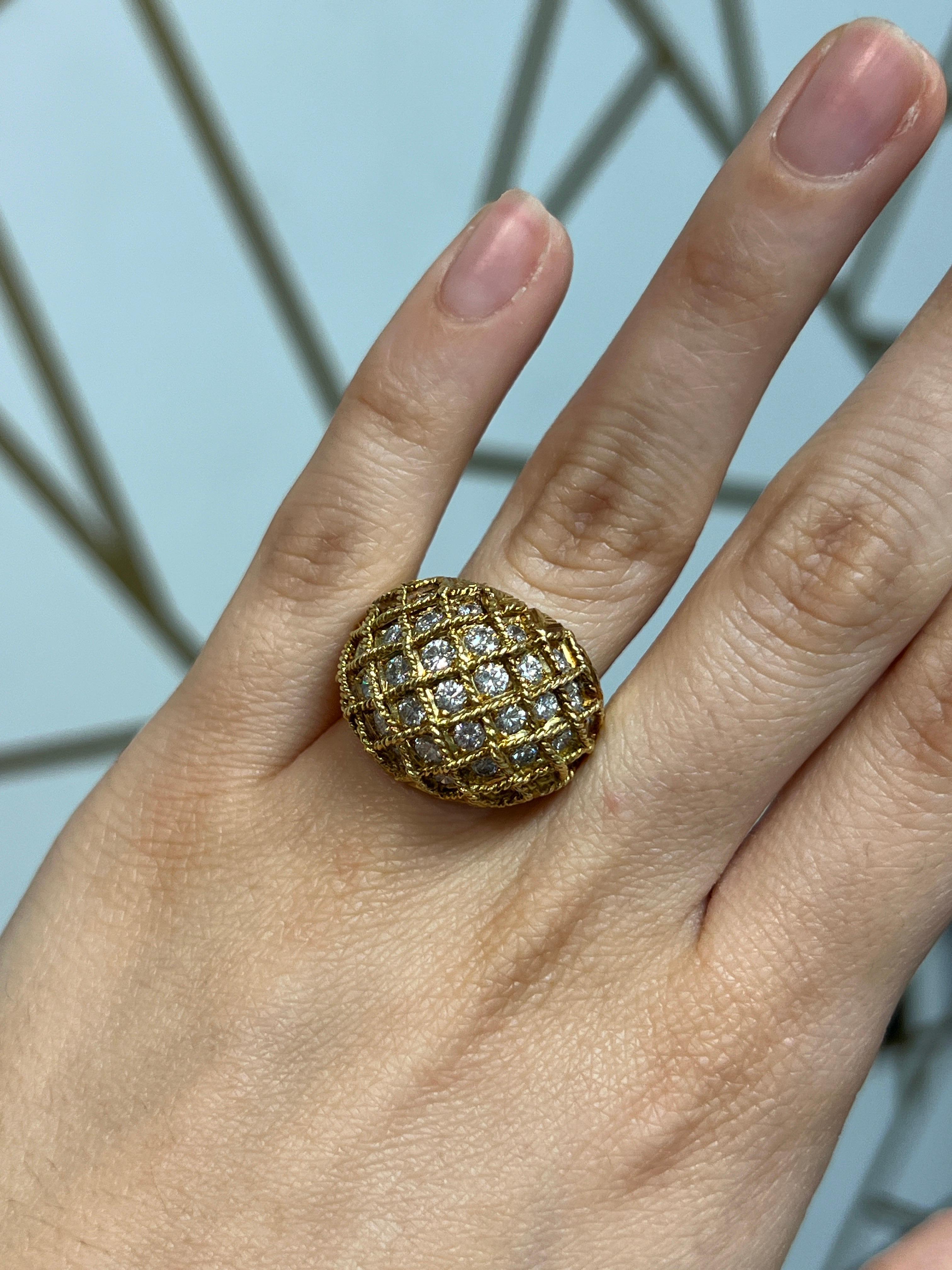Diamond Cocktail Ring

A vintage dome cocktail ring set with 35 round diamonds 

Approximate Diamond Weight: 2.29 carat 
Weight:  17.3 grams
Ring Size: 5.5
Resizable free of charge
Metal type: 18 Karat gold