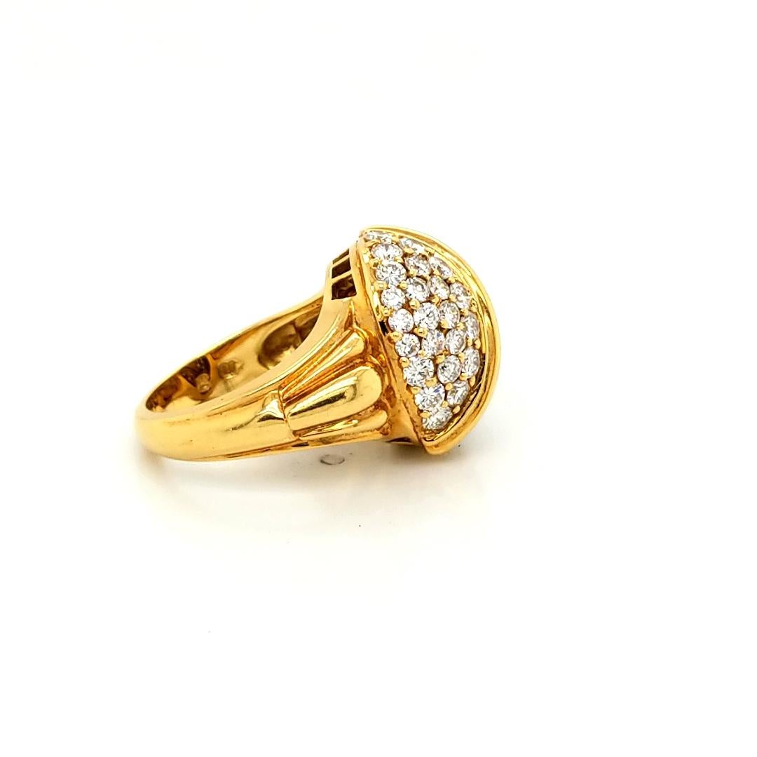 An elegant cocktail ring made in 18K yellow gold and embellished with round diamonds.
46 diamonds weighing 4.60 carats.
Color: H-I
Clarity: VS
Size: 5,5
