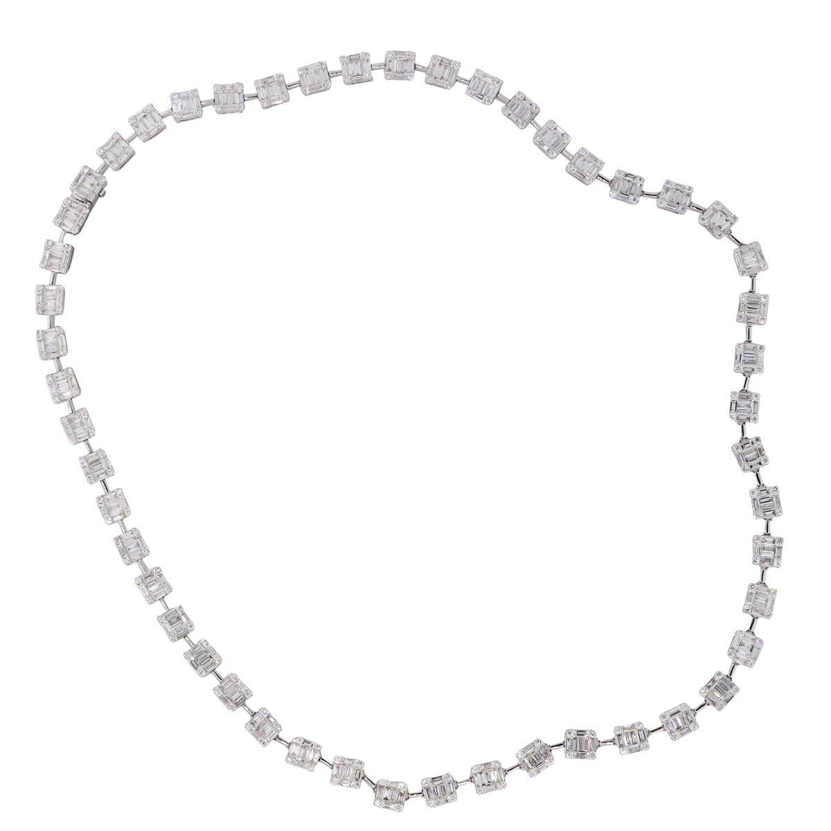 Material: 18k white gold
Diamond Details: Approximately 1.78ctw of round brilliant diamonds (200 stones). Approximately 9.08ctw of baguette shape diamonds (319 stones). Diamonds are G/H in color and VS in clarity
Necklace Measurements: Necklace is