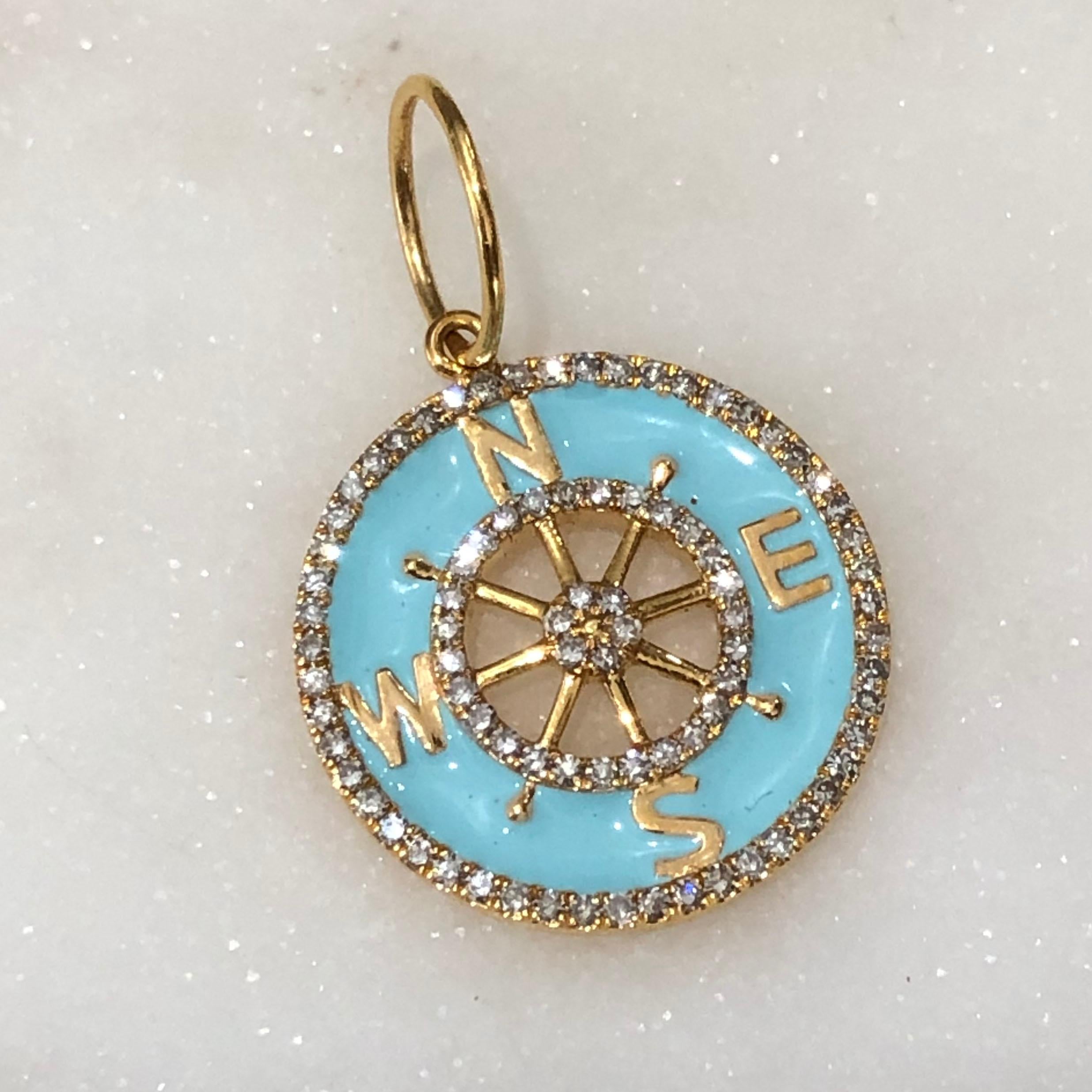 Finely detailed diamond compass charm crafted in 14k yellow gold.  

Diamonds total an estimated 0.30 carats (estimated at H-I color and VS2-SI2 clarity).
The finely detailed charm features egg shell blue enamel with compass points to North, South
