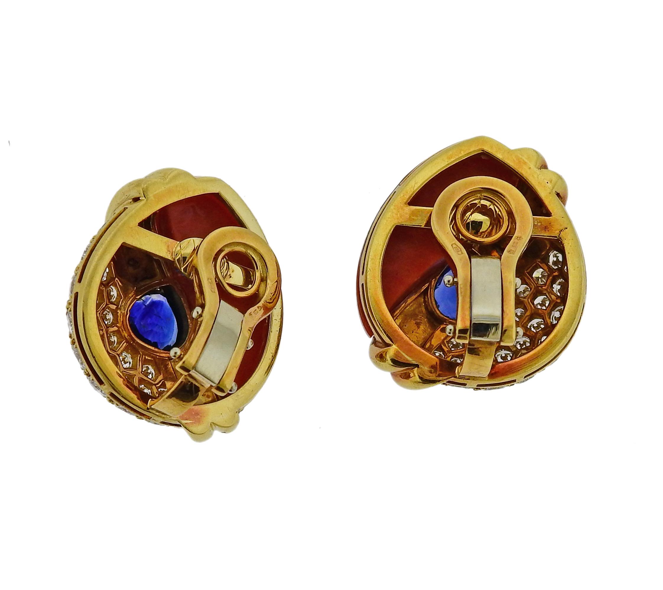 Beautiful 18k gold earrings, adorned with sapphires, coral and approx. 2.30ctw in G/VS-SI1 diamonds. Earrings are measured  26mm x 21mm. Weight is 
23.2 grams. Marked:  750, 1235 AL.