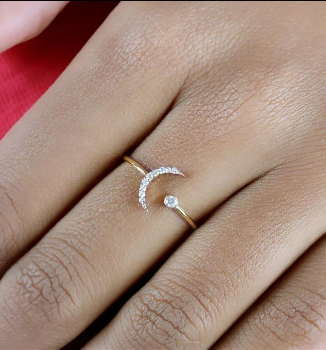 Diamond Crescent Moon Ring 14k Gold Bridal Jewelry Wedding Day Diamond Ring.

Total Carat Weight
0.24 & Under
Base Metal
Yellow Gold, 14k
Gross Weight
0.985 Grams Approx
Metal Purity
14k
14k Gold Weight
0.97 Grams Approx
Diamond Weight
0.076 cts