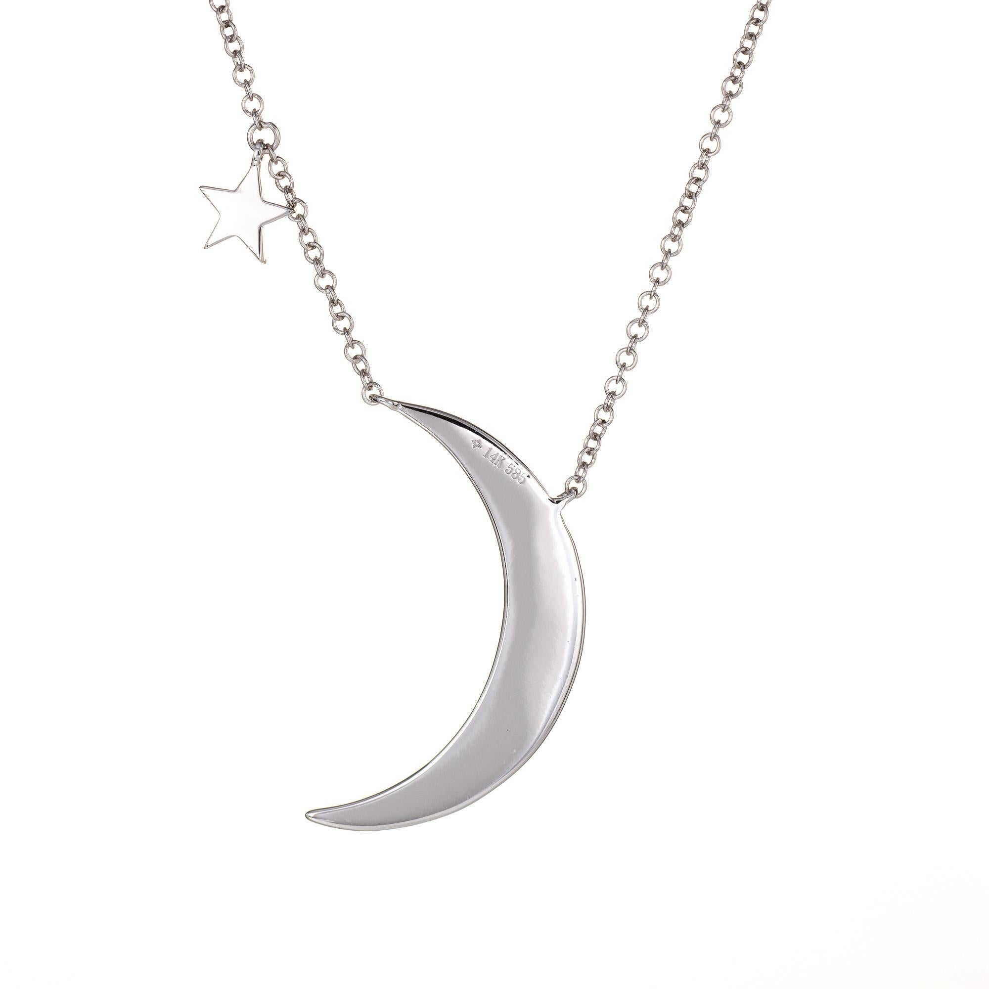 Stylish and finely detailed diamond crescent moon & star necklace crafted in 14 karat white gold.  

Diamonds total an estimated 0.45 carats (estimated at G-H color and VS2-SI2 clarity). 

The pendant features diamonds finely pave set into the