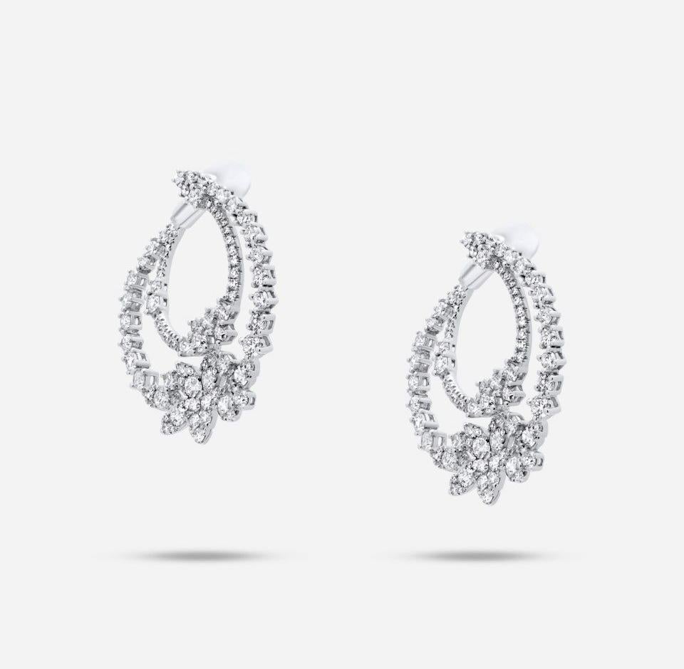 Diamond Crescent Earrings
18 Karat White Gold
3.75 CTW F Color VS Clarity Diamonds
Genuine White Diamonds - Very Beautiful & Sparkly 