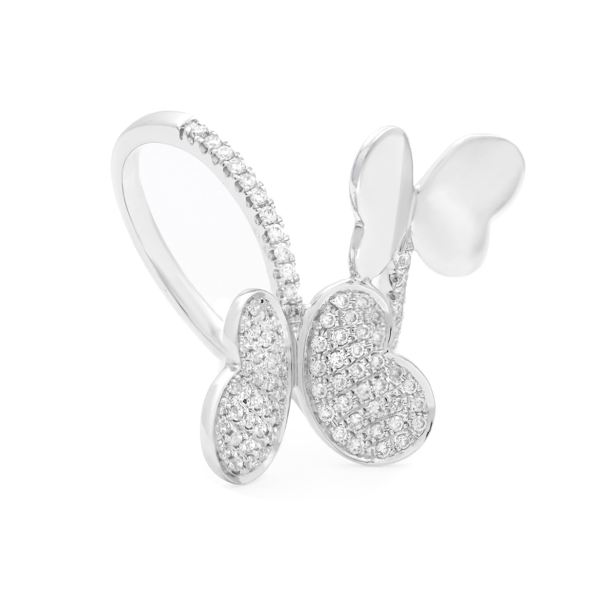 A fun and delicate criss cross diamond butterfly ring. The ring is designed with two beautifully crafted butterflies pave set with sparkling round cut diamonds. The butterflies face each other, one with diamonds and one without. A great pick for any
