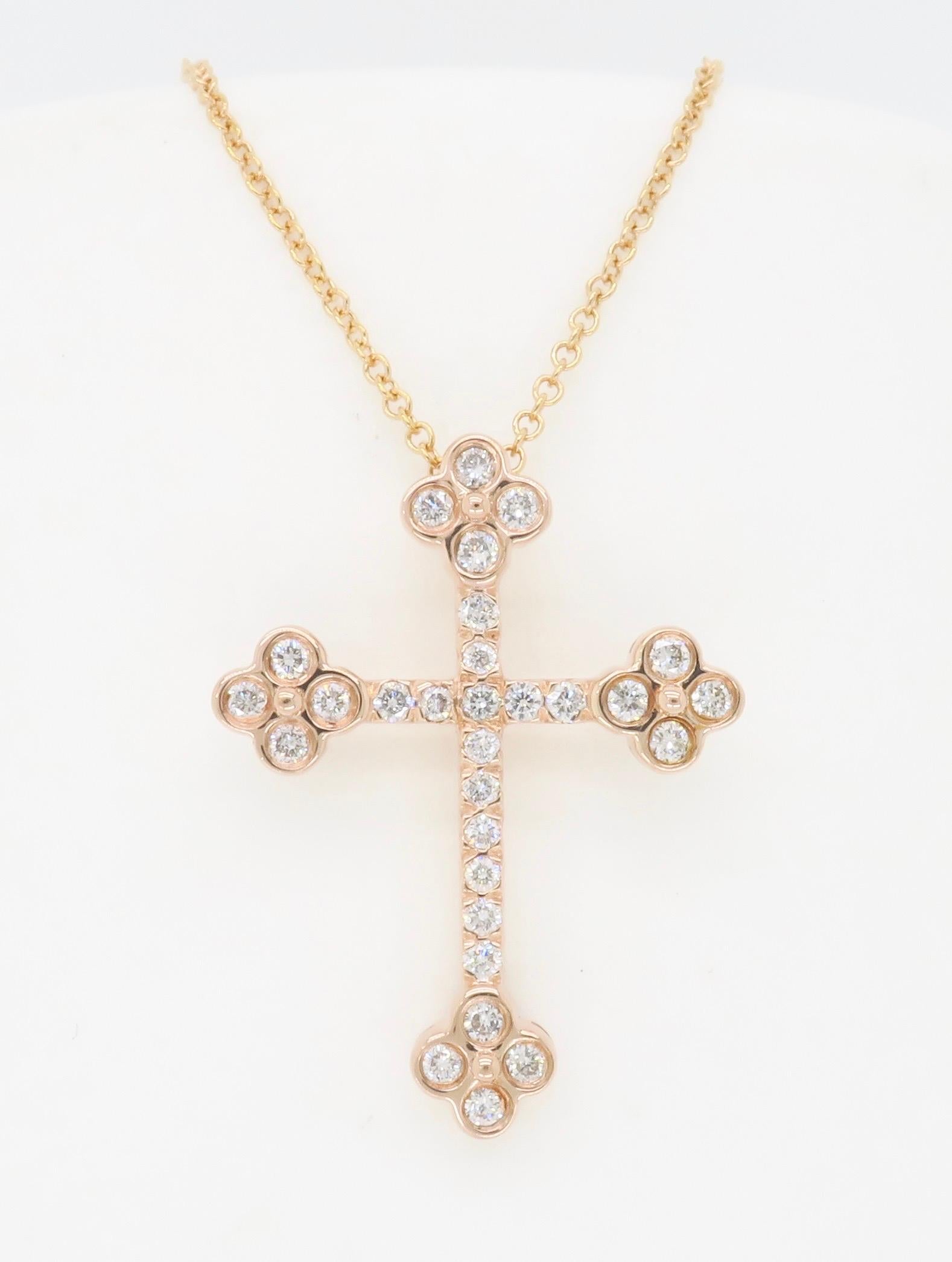 14k Rose Gold Diamond cross necklace made by EFFY.

Diamond Carat Weight: Approximately .50CTW
Diamond Cut: Round Brilliant
Color: Average F-H 
Clarity: Average SI
Metal: 14K Rose Gold
Pendant Length: 1