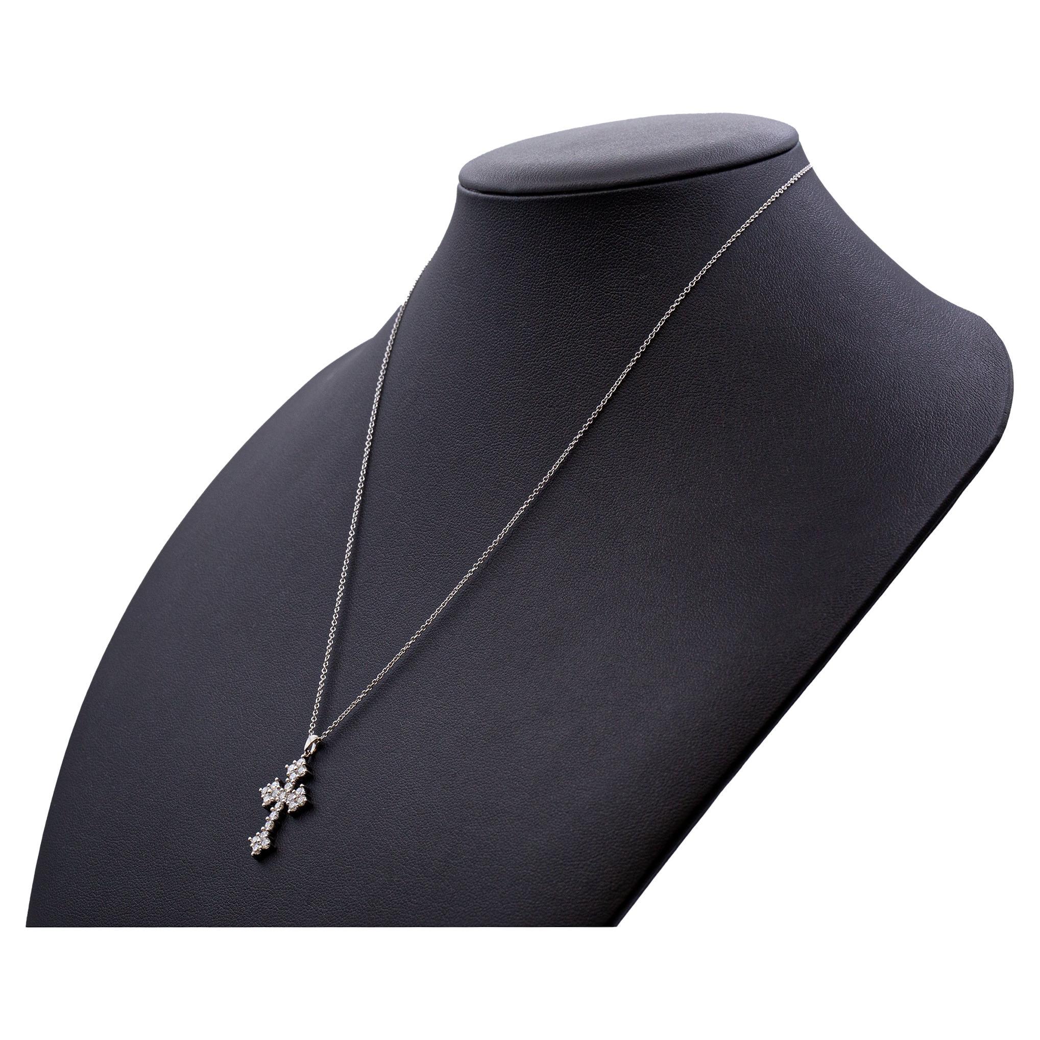 Diamond Cross Necklace in 14K White Gold
on 16'' chain
total carat weight is 0.90ct F/G color and VS clarity natural diamonds
