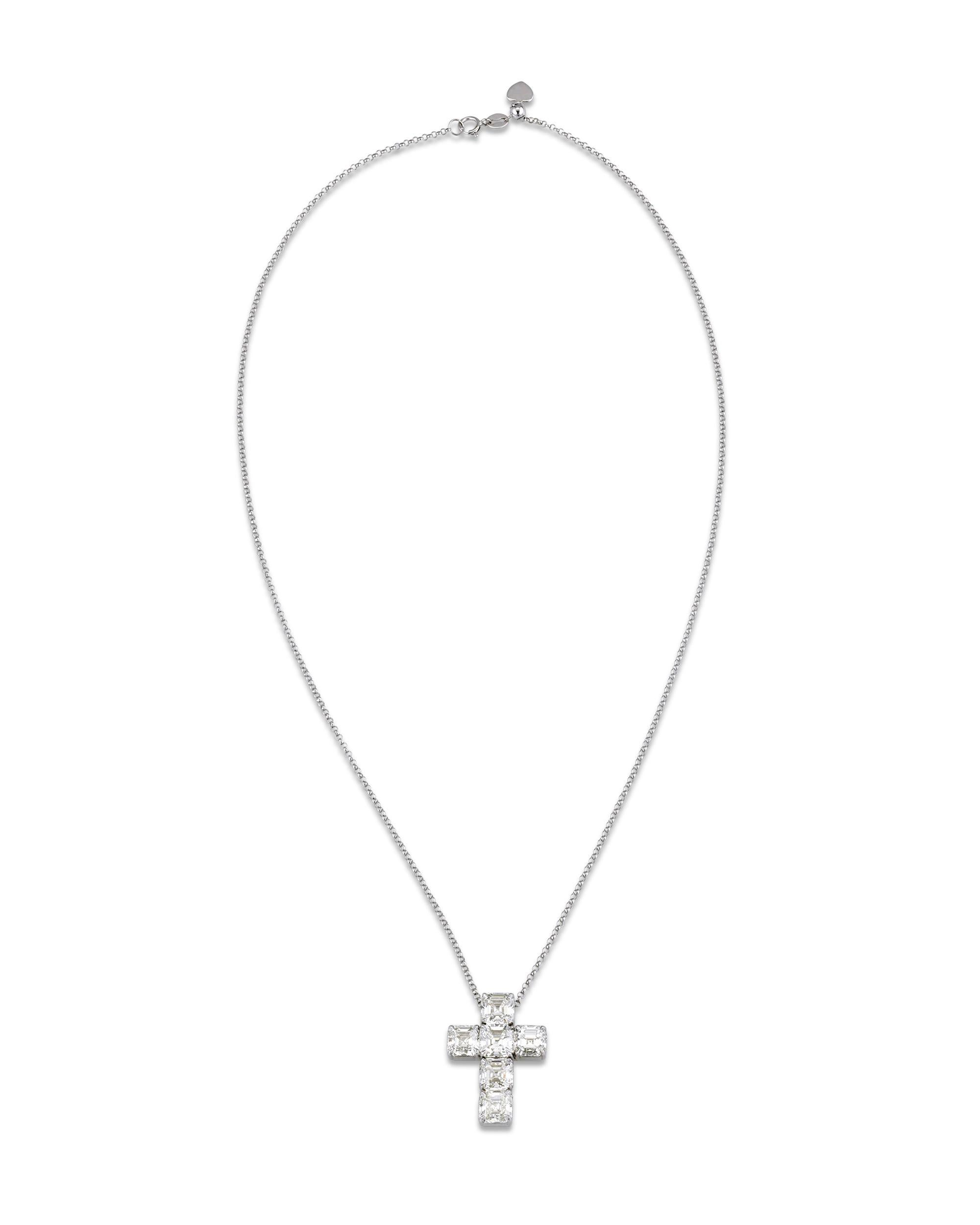 Six impeccably matched Asscher-cut diamonds grace this exquisite cross pendant. These eye-catching gems weigh a brilliant 6.33 total carats, with each stone ranging from 1.00 carat to 1.12 carats. To find six stones so beautifully matched is quite