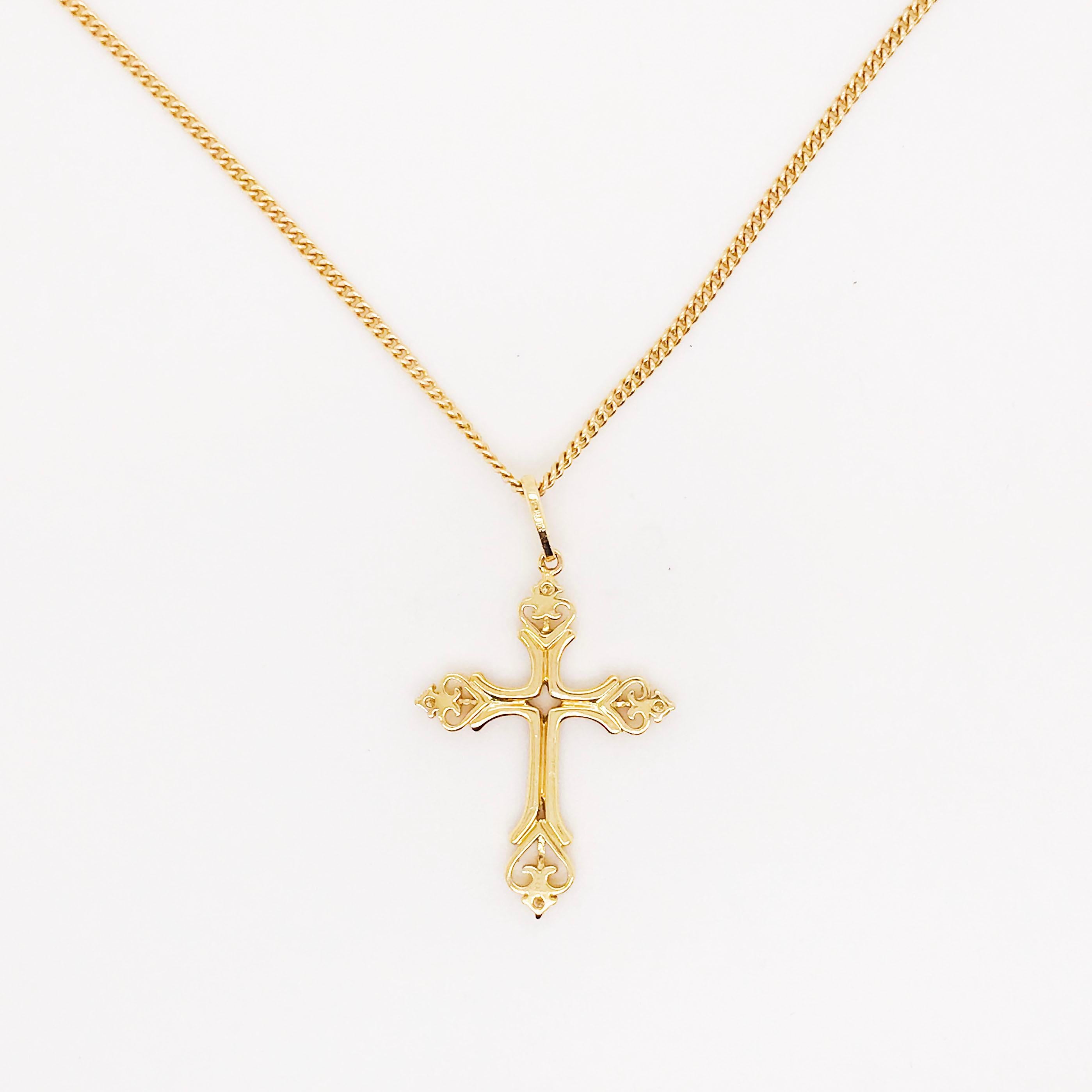 This gorgeous, intricate diamond cross pendant is a stunning and striking design. The cross pendant is made in 18 karat yellow gold with genuine, natural diamonds. The cross design has handmade beading and milgrain texture that balances the pave