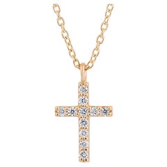Pendentif croix en or 14 carats et diamants
