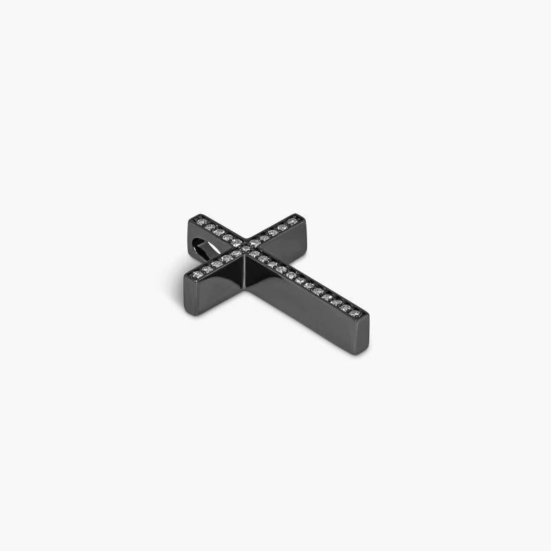Diamond Cross Pendant in Black Rhodium Plated Sterling Silver

Our sparkling single cut diamond pave cross features 28 single cut white diamonds set on a black rhodium-plated sterling silver frame. Add to your favourite Tateossian chain and enjoy