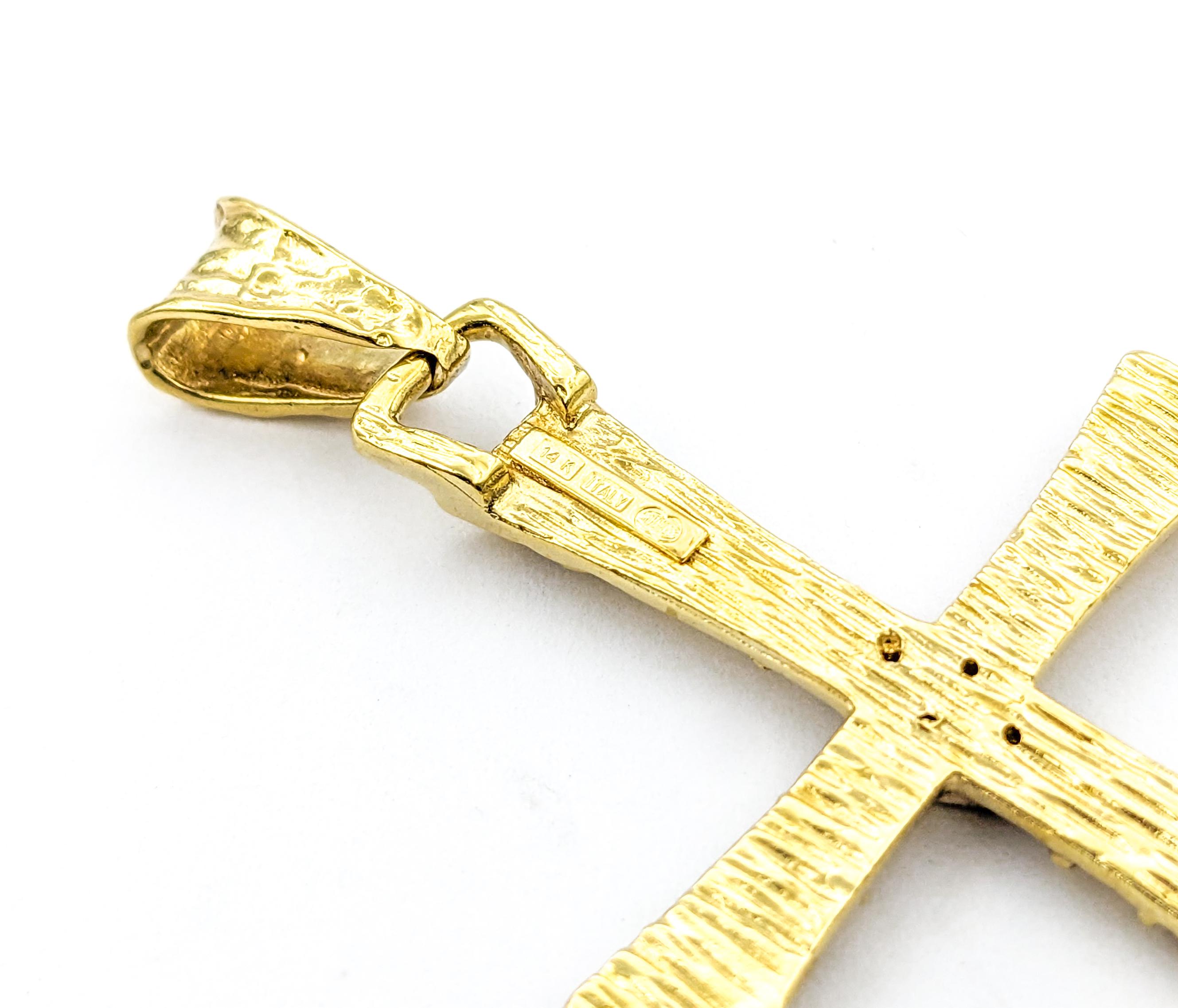 Diamond Cross Pendant In Yellow Gold

Showcasing a magnificent Diamond Fashion Pendant, meticulously designed in 14kt Yellow Gold. This exquisite piece highlights a textured cross design, adorned with .04ctw diamonds that sparkle with I clarity and