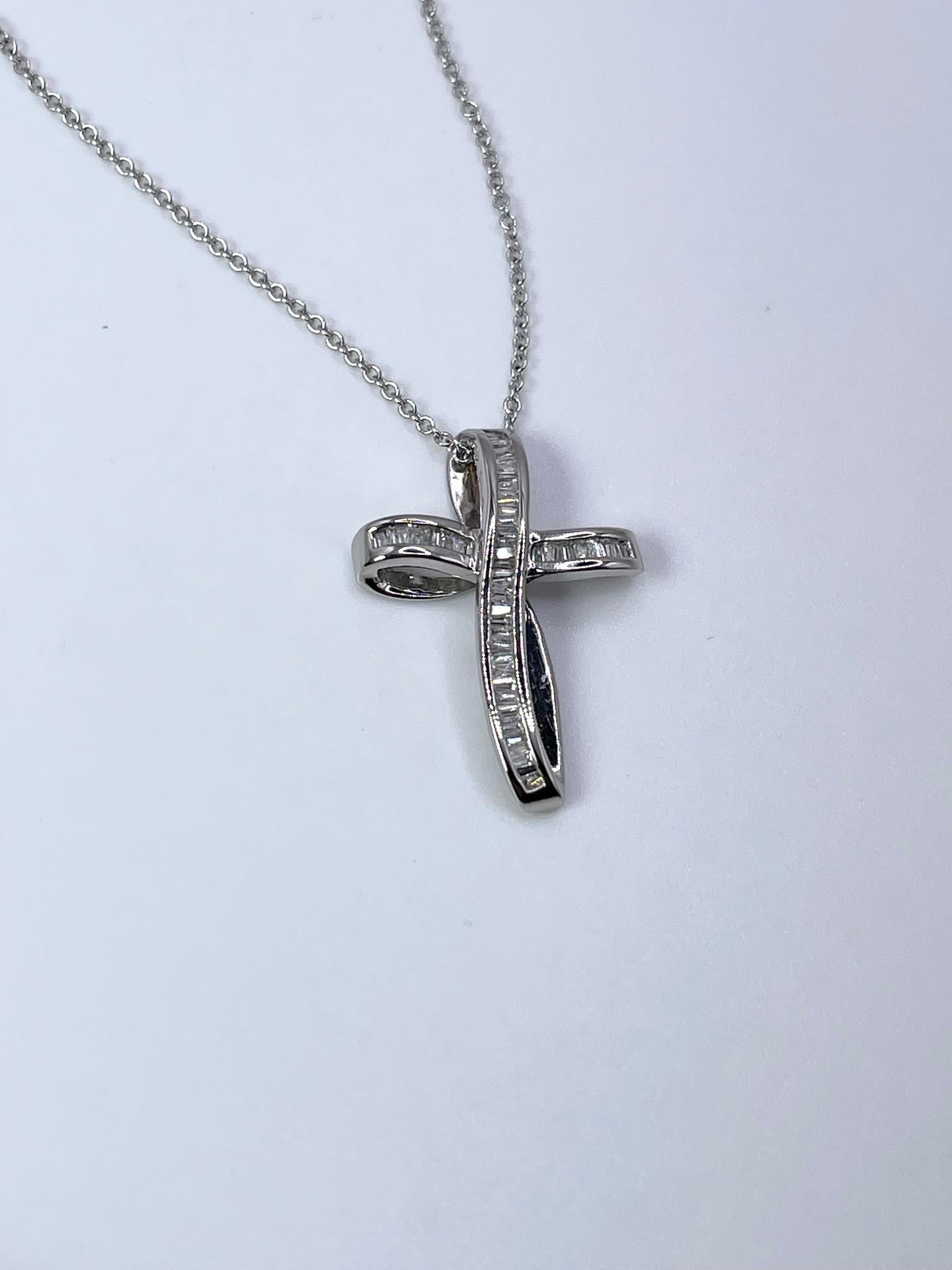 Stunning large cross pendant necklace made with baguette diamonds in channel setting in 14KT white gold. Beautiful finish polishied pendant neckllace!!!
GRAM WEIGHT: 2.71gr
GOLD: 14KT white gold
NECKLACE chain-18