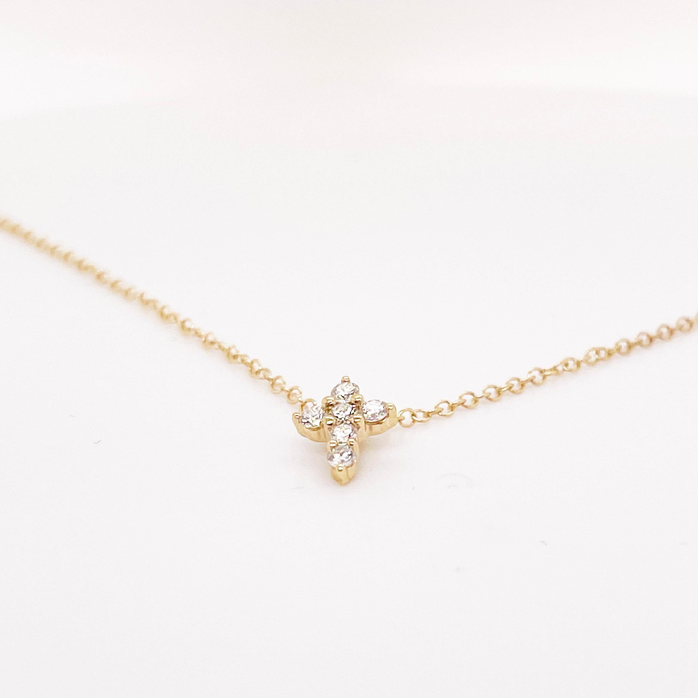 This petite diamond cross necklace is a perfect everyday piece and made even more sleek and stylish by the hidden bail making the cross seem to float on the beautifully slim and durable cable link chain. The petite cross is subtle, but offers