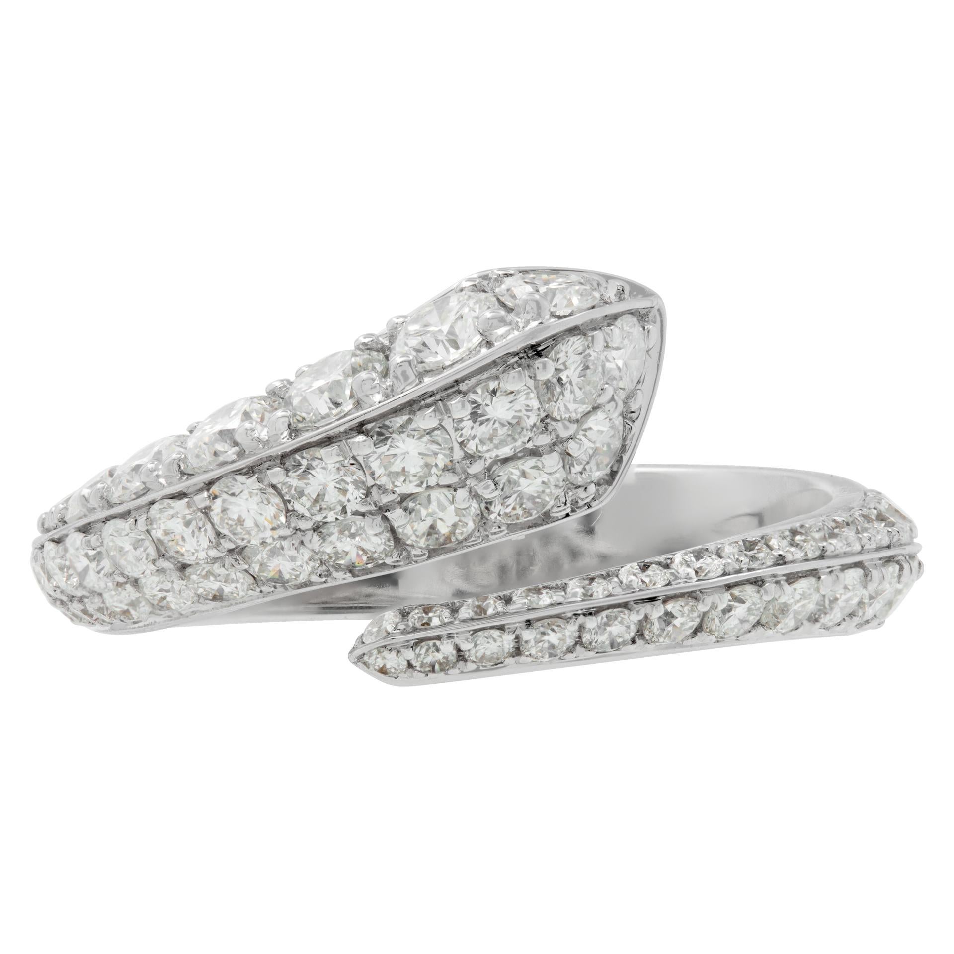 Diamond crossover ring in 18k white gold with 1.56 carats in round brilliant cut diamonds (G-H Color, VS Clarity). Size 6.5.This Diamond ring is currently size 6.5 and some items can be sized up or down, please ask! It weighs 4.53 gramms and is 18k