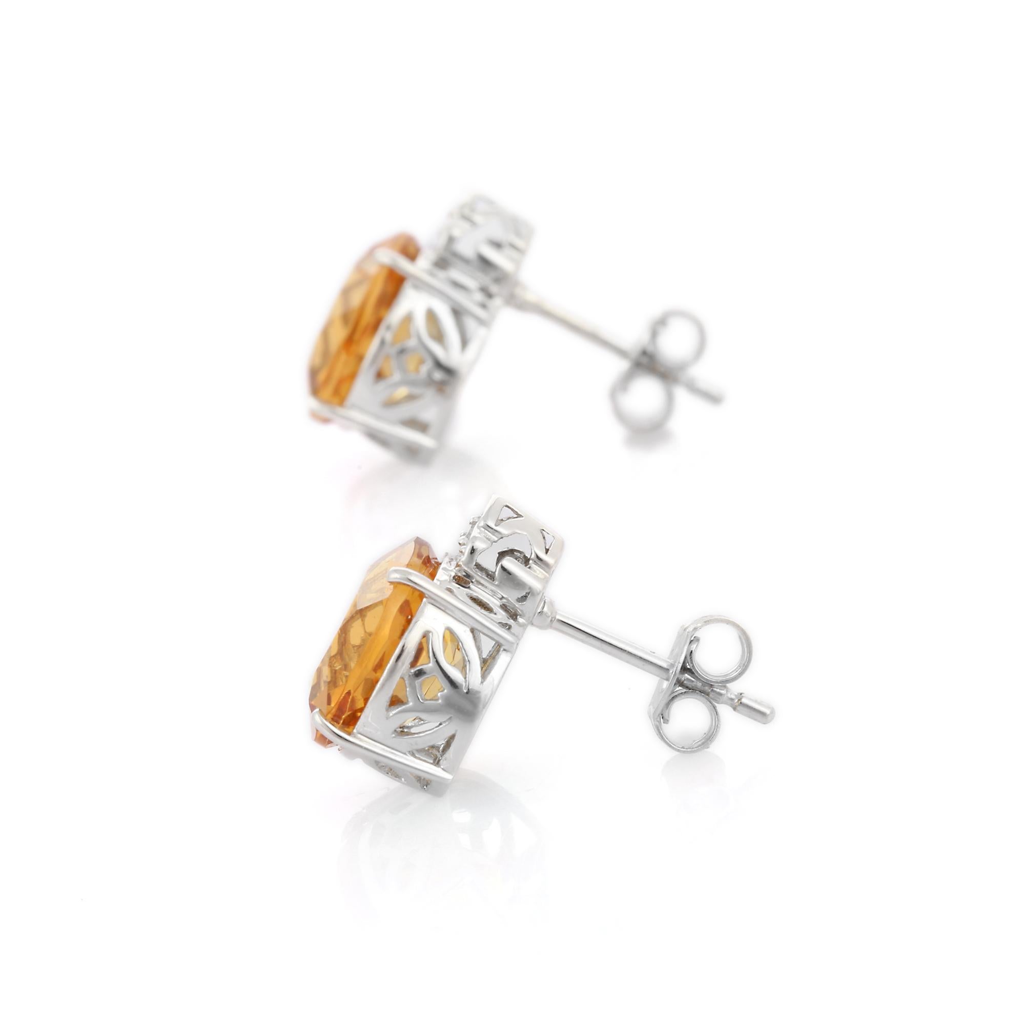 Studs create a subtle beauty while showcasing the colors of the natural precious gemstones and illuminating diamonds making a statement.

Round cut citrine studs with diamonds in 14K gold. Embrace your look with these stunning pair of earrings