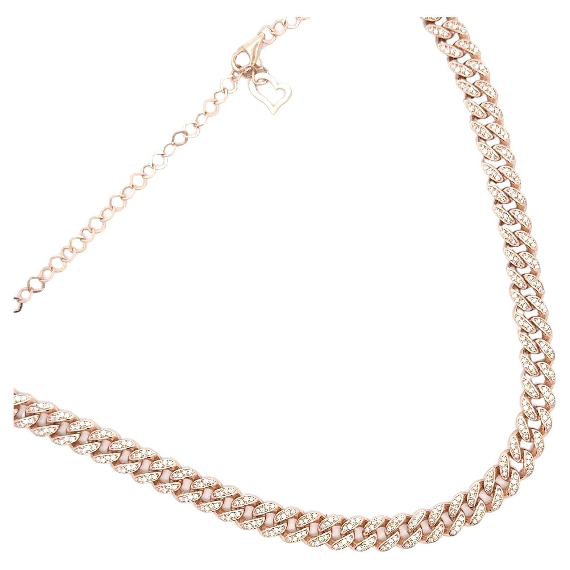 14 Karat rose gold necklace featuring 400 round brilliants in a Cuban link chain weighing 1.88 carats.
Color F
Clarity VS1-VS2

Can be made in white & yellow gold. 
DM for more info