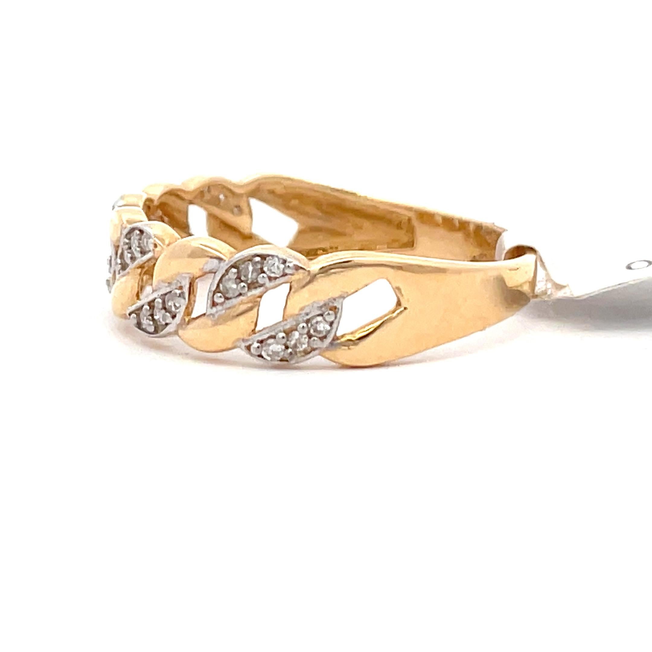 Cuban and gold link fashion ring with round brilliants weighing 0.10 carats.
