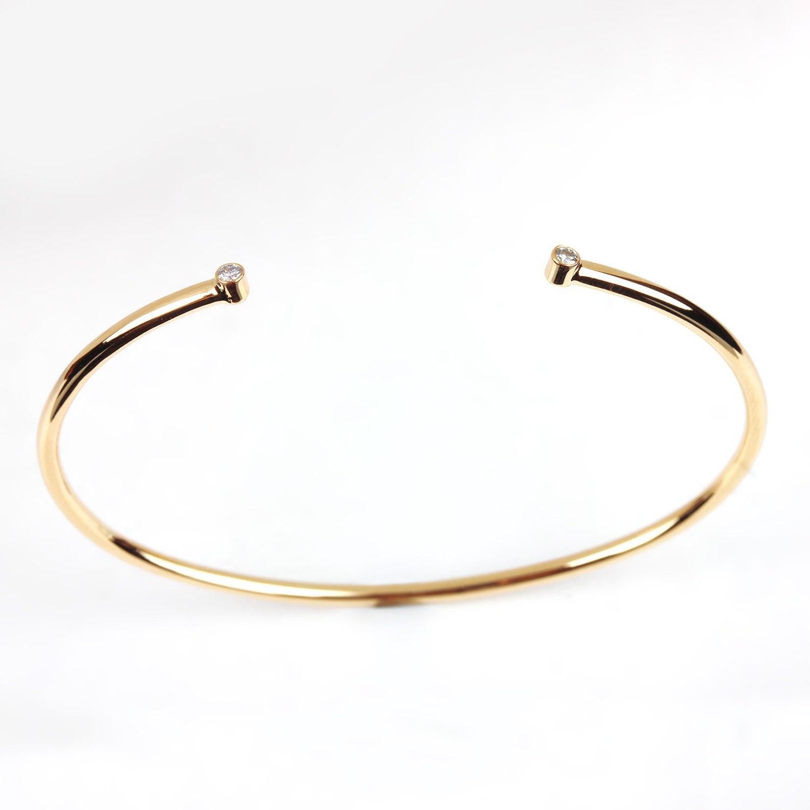 Diamond Cuff Bangle Bracelet 14k Yellow Gold Fine Jewelry Unique Gift For Women 

Materials: Gold, Stone
Gemstone: Diamond
Closure: Slide lock
Bracelet width: 60 Millimetres
Bracelet length: 45 Millimetres

14k Yellow Gold Weight:- 3.03
